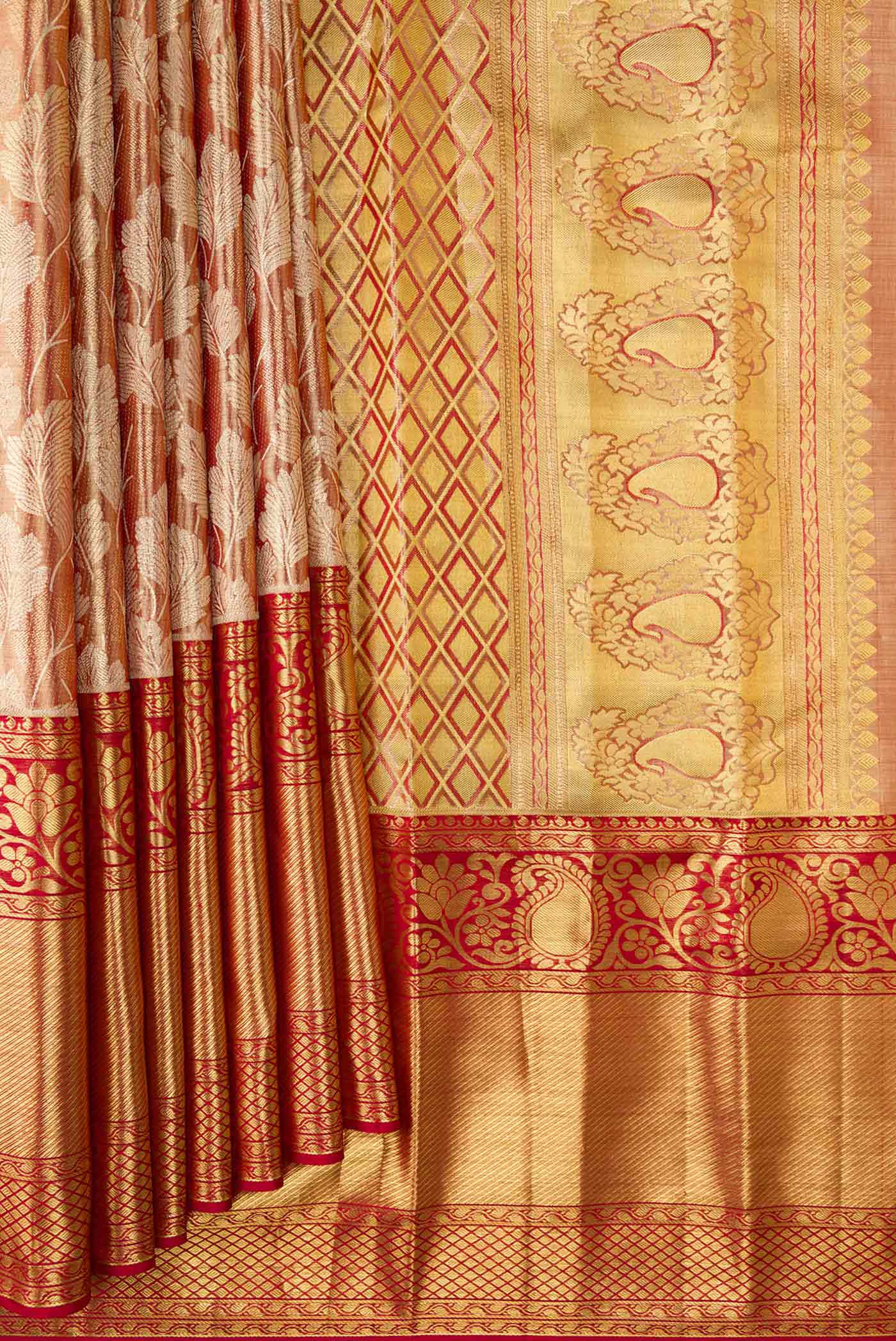 Pleats and pallu of Maroon Dual Tone Kanjivaram Tissue Silk Saree with Zari Brocade on the body and Zari Border. 