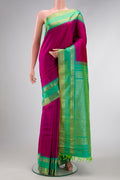 Pink Dual Tone Gadwal Silk Saree with Plain Body and Zari Border.  displayed on a mannequin