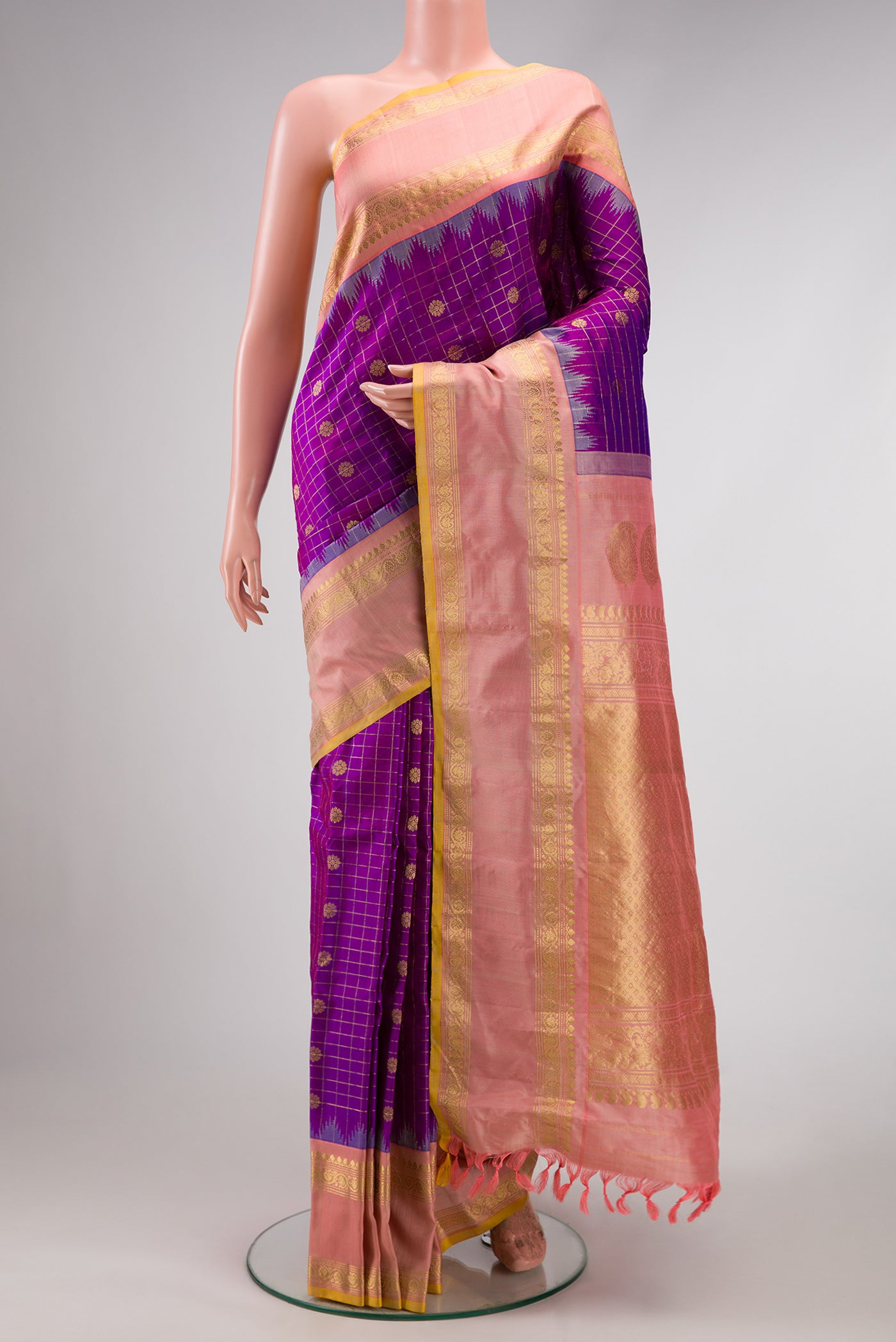 Purple Dual Tone Gadwal Silk Saree with Zari Butta on the body and Zari Border.  displayed on a mannequin