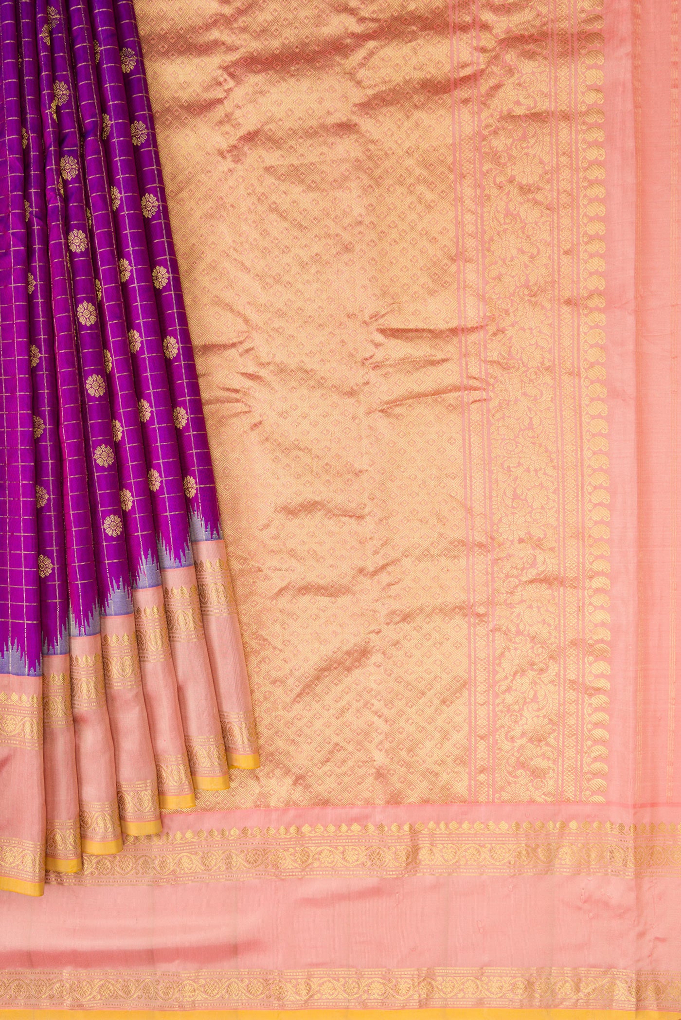 Pleats and pallu of Purple Dual Tone Gadwal Silk Saree with Zari Butta on the body and Zari Border. 