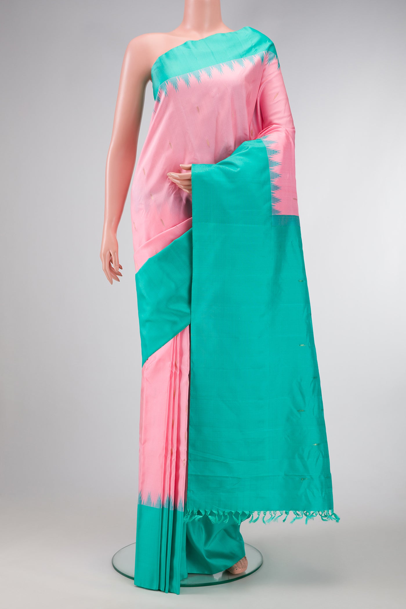 Pink Dual Tone Gadwal Silk Saree with Zari Butta on the body and Temple Border.  displayed on a mannequin
