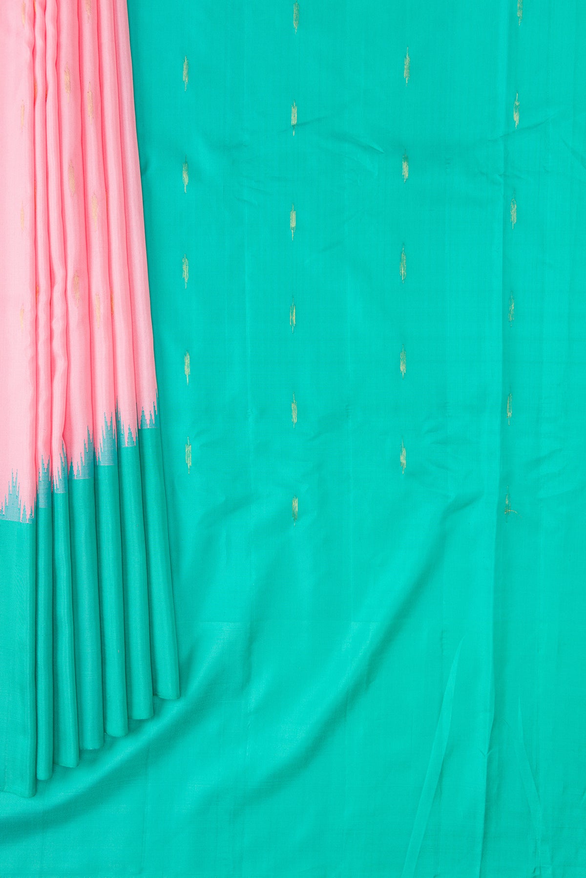 Pleats and pallu of Pink Dual Tone Gadwal Silk Saree with Zari Butta on the body and Temple Border. 