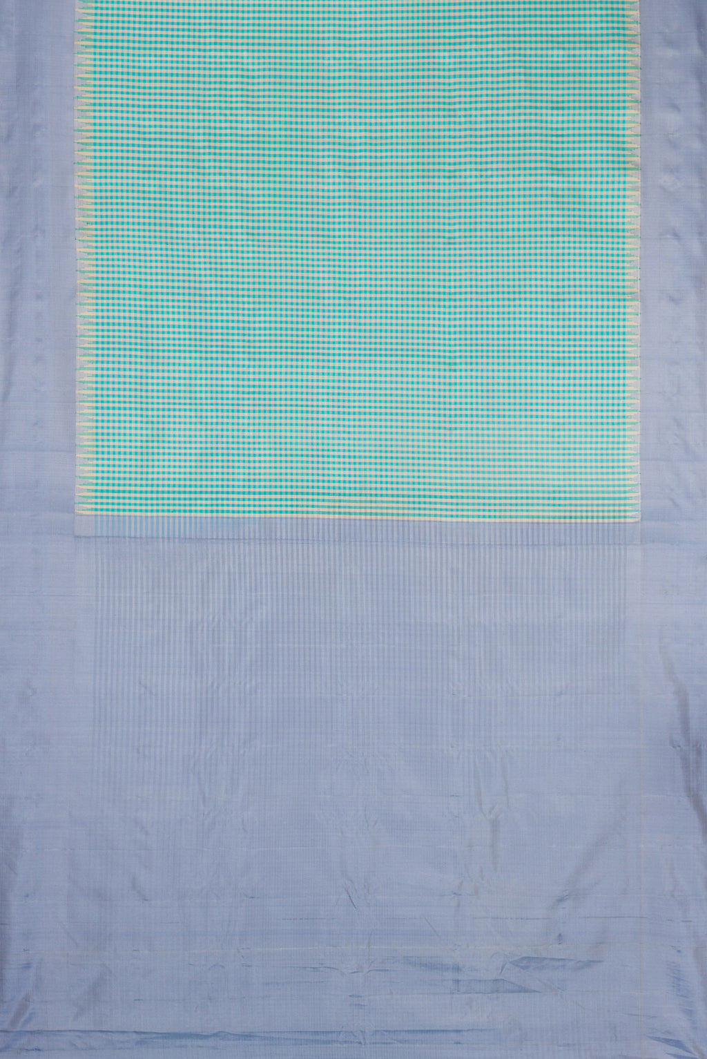 Flat view of Light Blue Dual Tone Gadwal Silk Saree with Checked design on the body and Plain Border. 