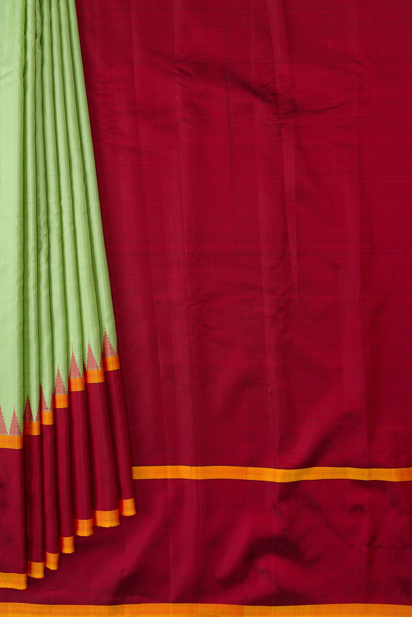 Pleats and pallu of Pista Green Dual Tone Gadwal Silk Saree with Plain Body and Temple Border. 