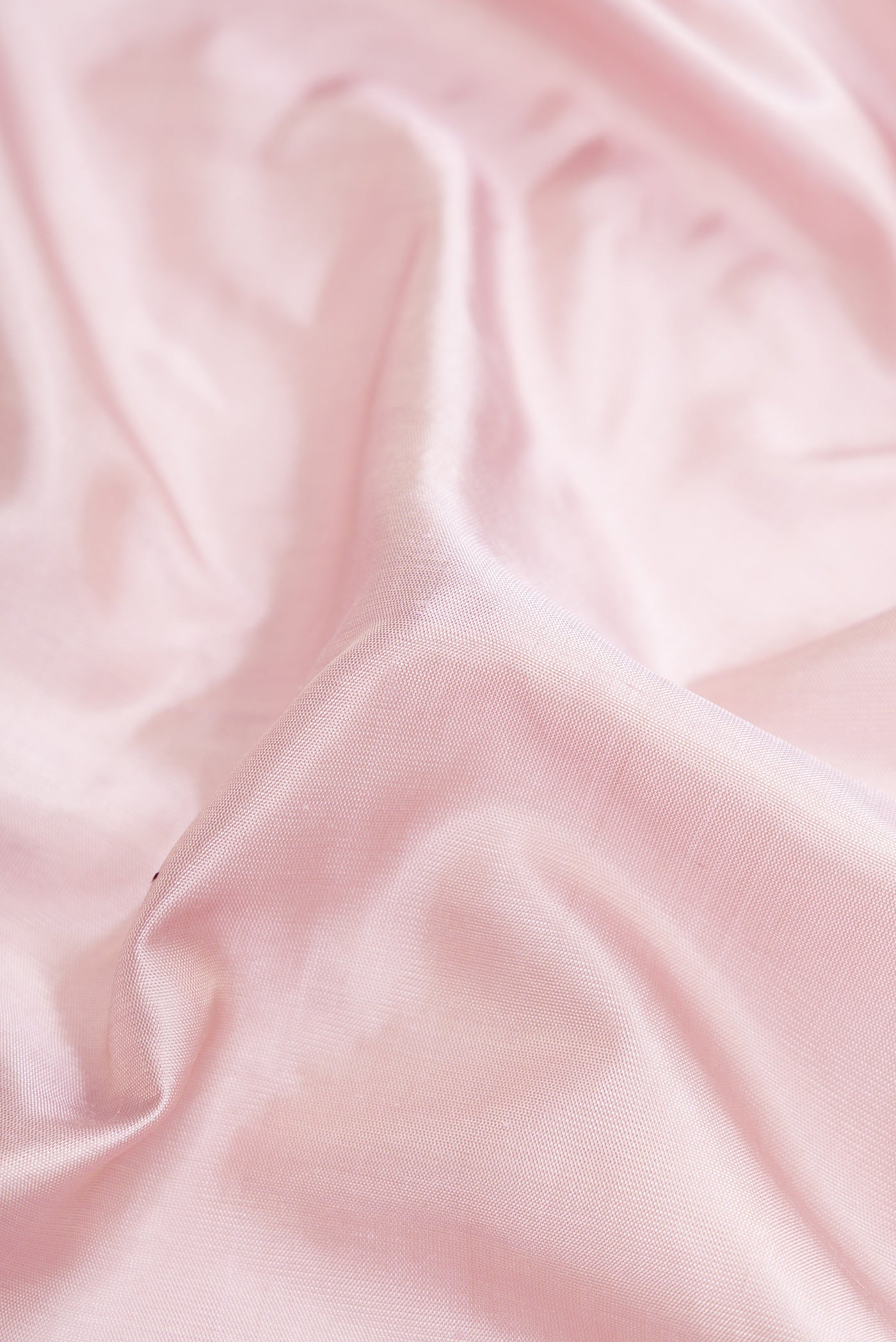 Close up of Lilac Dual Tone Gadwal Silk Saree with Plain Body and Zari Border.  displaying folds