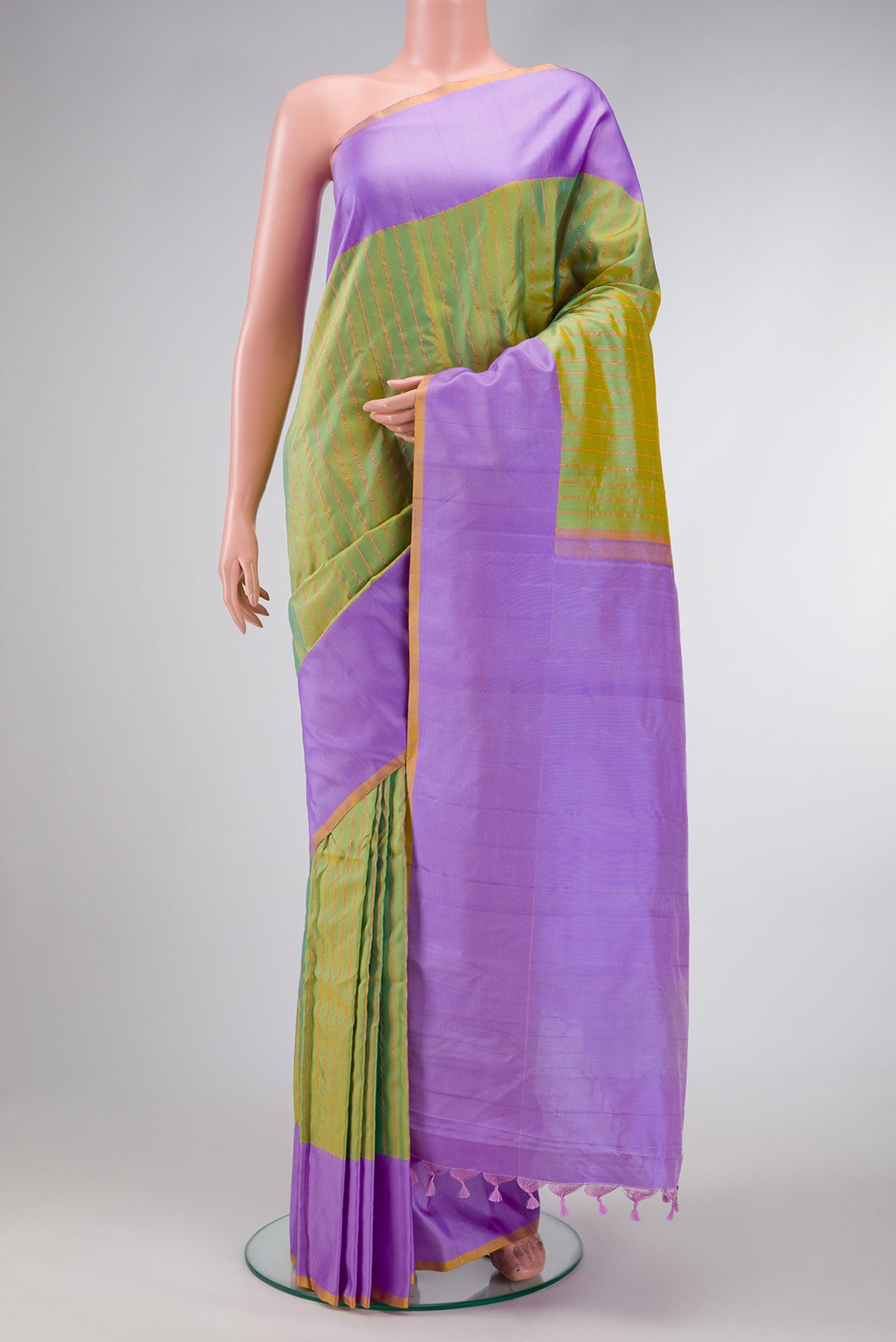 Green Dual Tone Gadwal Silk Saree with Stripes on the body and Plain Border.  displayed on a mannequin