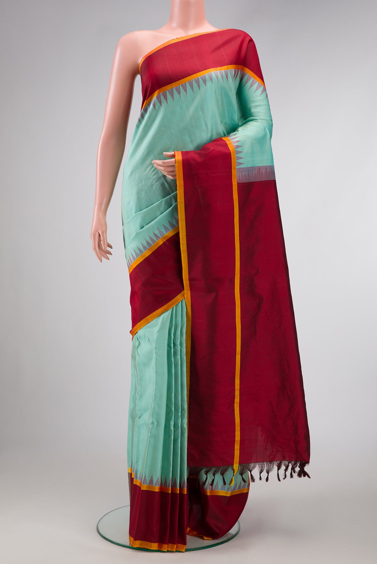 Sky Blue Dual Tone Gadwal Silk Saree with Plain Body and Zari Border.  displayed on a mannequin