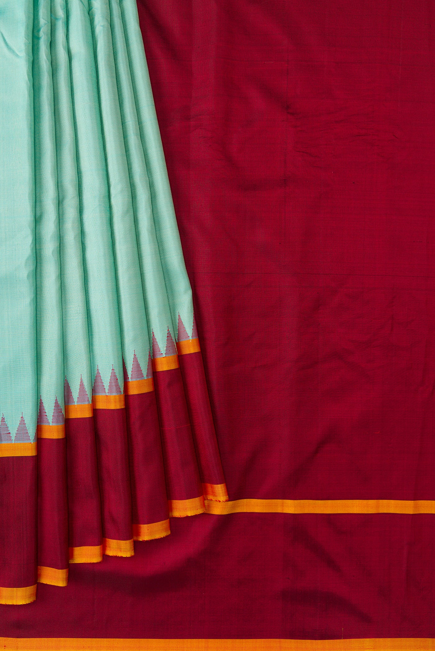 Pleats and pallu of Sky Blue Dual Tone Gadwal Silk Saree with Plain Body and Zari Border. 