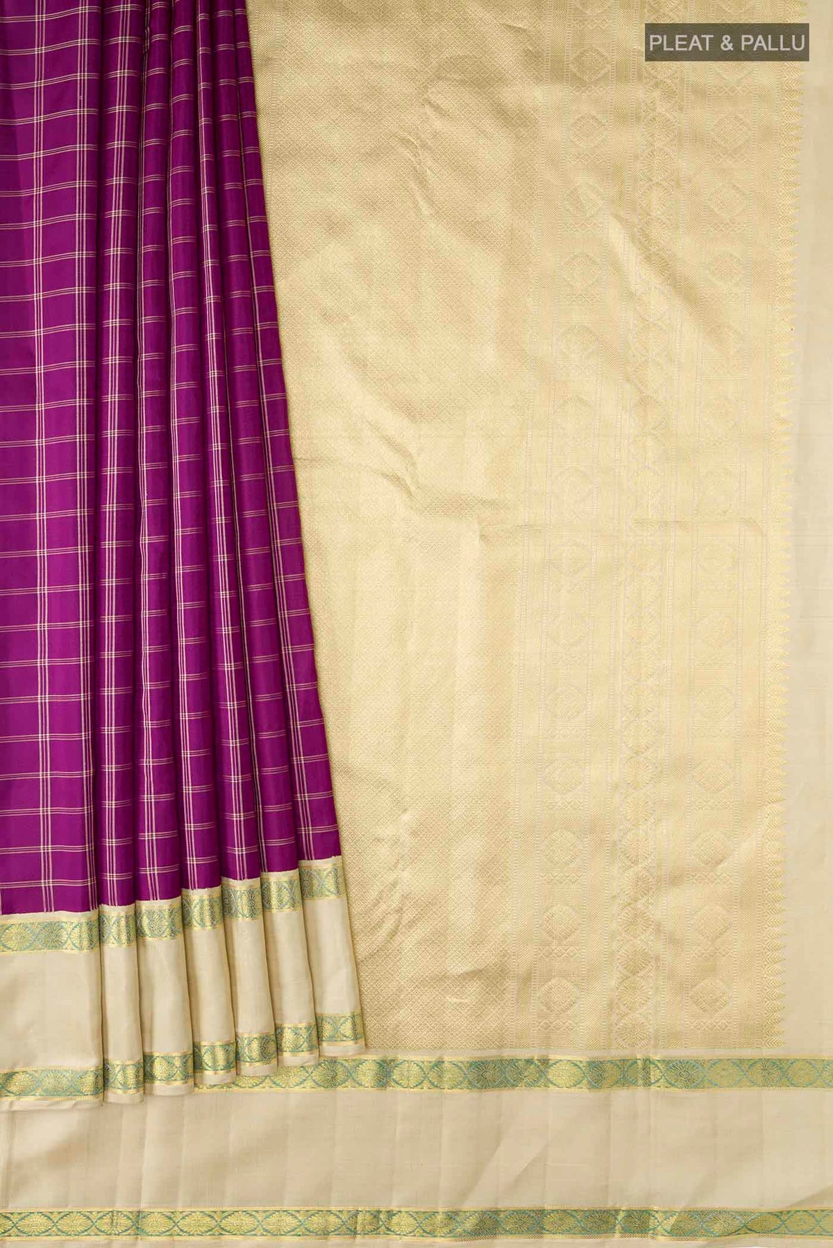 Pleats and pallu of Purple Kanchipuram Silk Saree with Checked design on the body and Zari Border