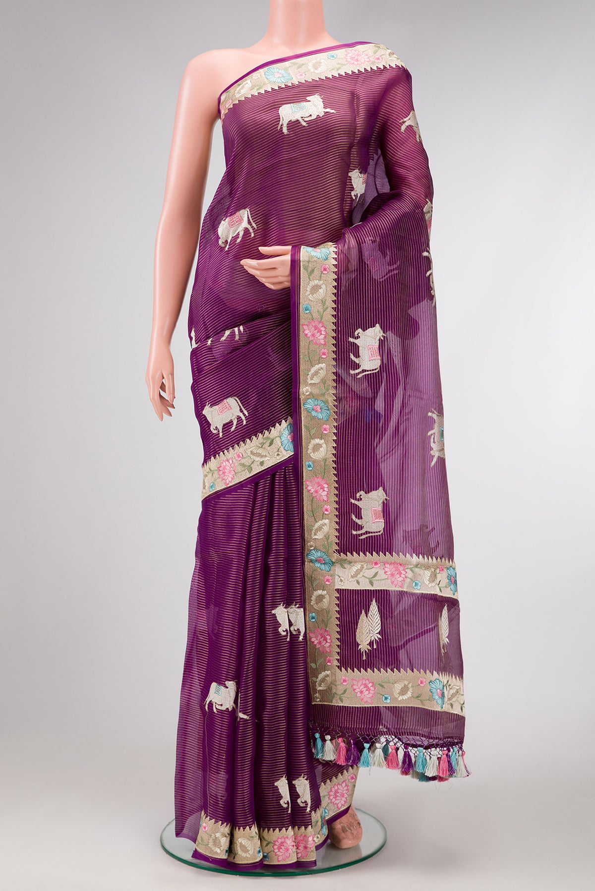 Purple Dual Tone Organza Silk Saree with Embroidery on the body and Embroidery Border.  displayed on a mannequin