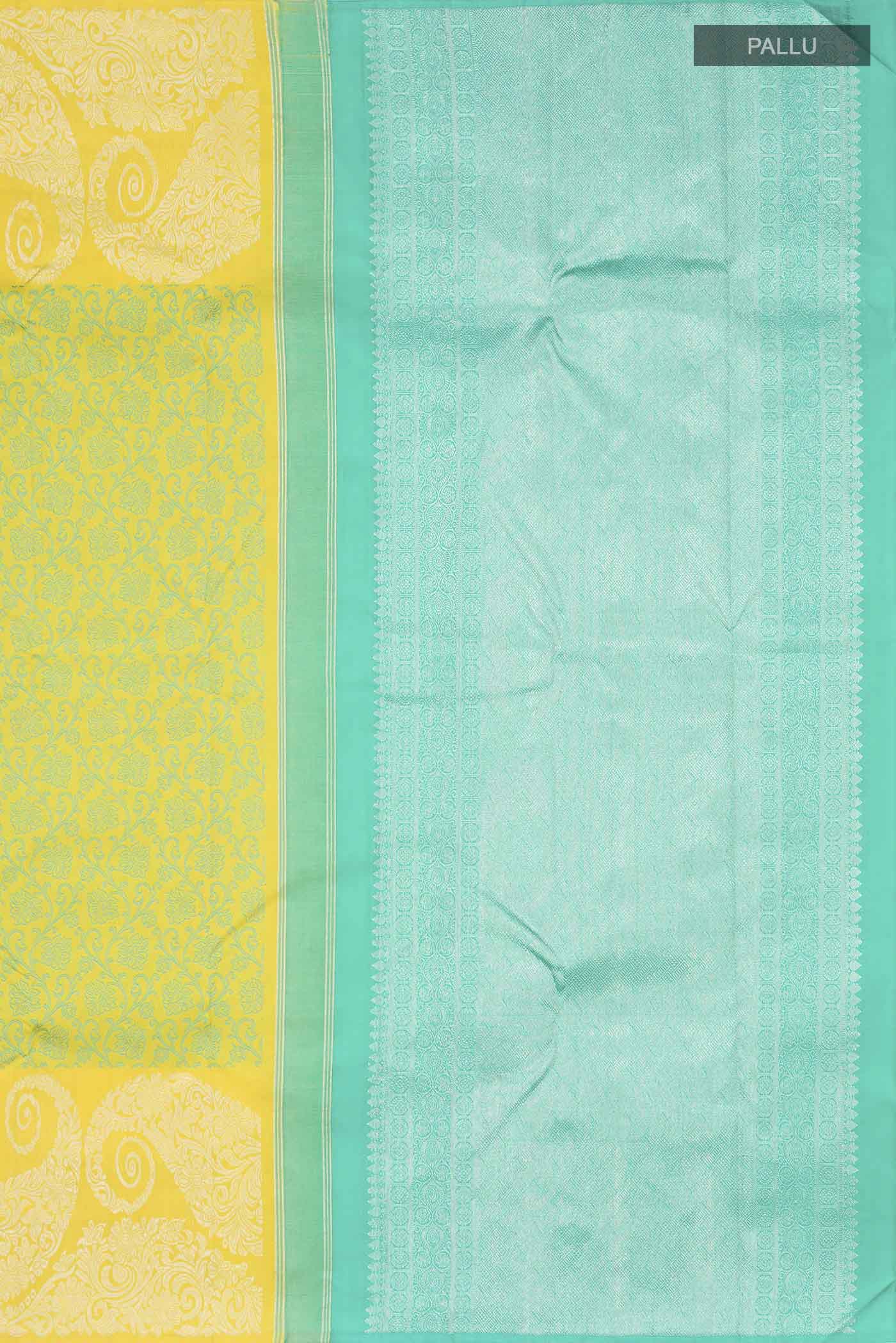 Close up image of the pallu of Green Kanchipuram Silk Saree with Jacquard design on the body and Zari Border