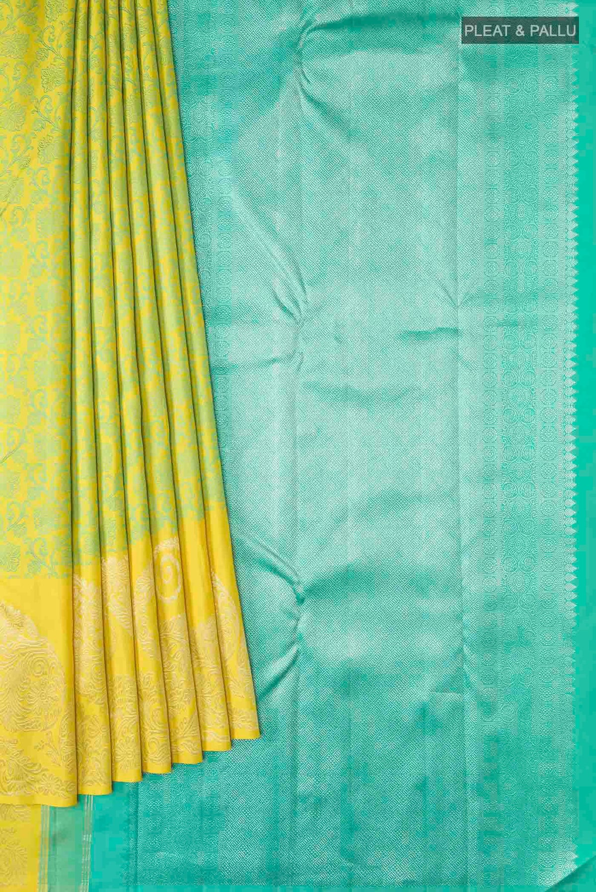 Pleats and pallu of Green Kanchipuram Silk Saree with Jacquard design on the body and Zari Border
