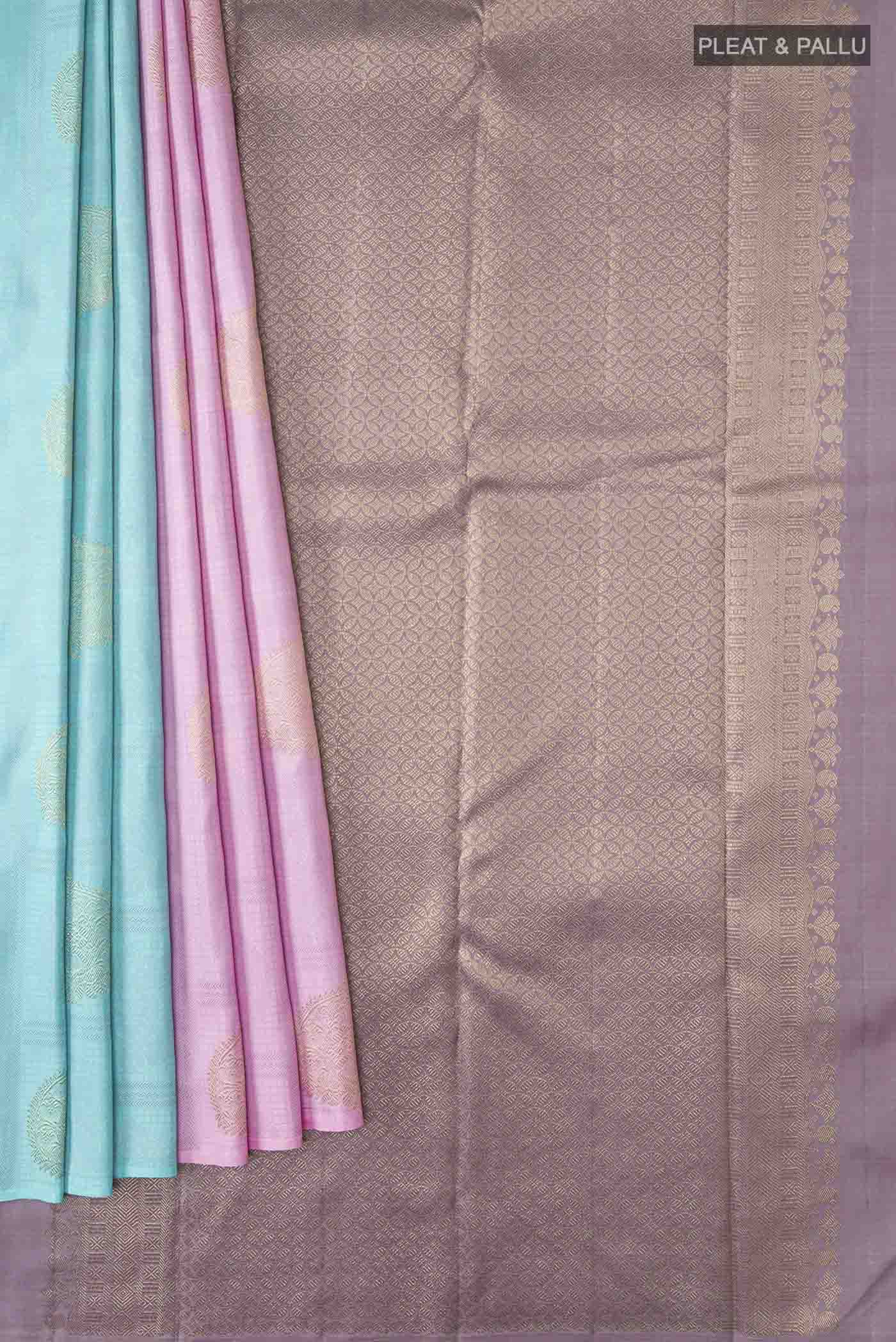 Pleats and pallu of Pink Kanchipuram Silk Saree with Half And Half on the body and Without Border