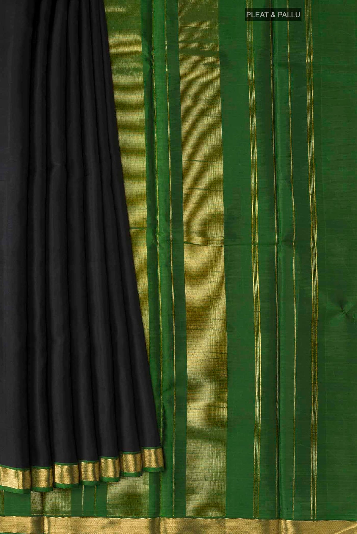 Pleats and pallu of Black Kanchipuram Silk Saree with Plain Body and Zari Border