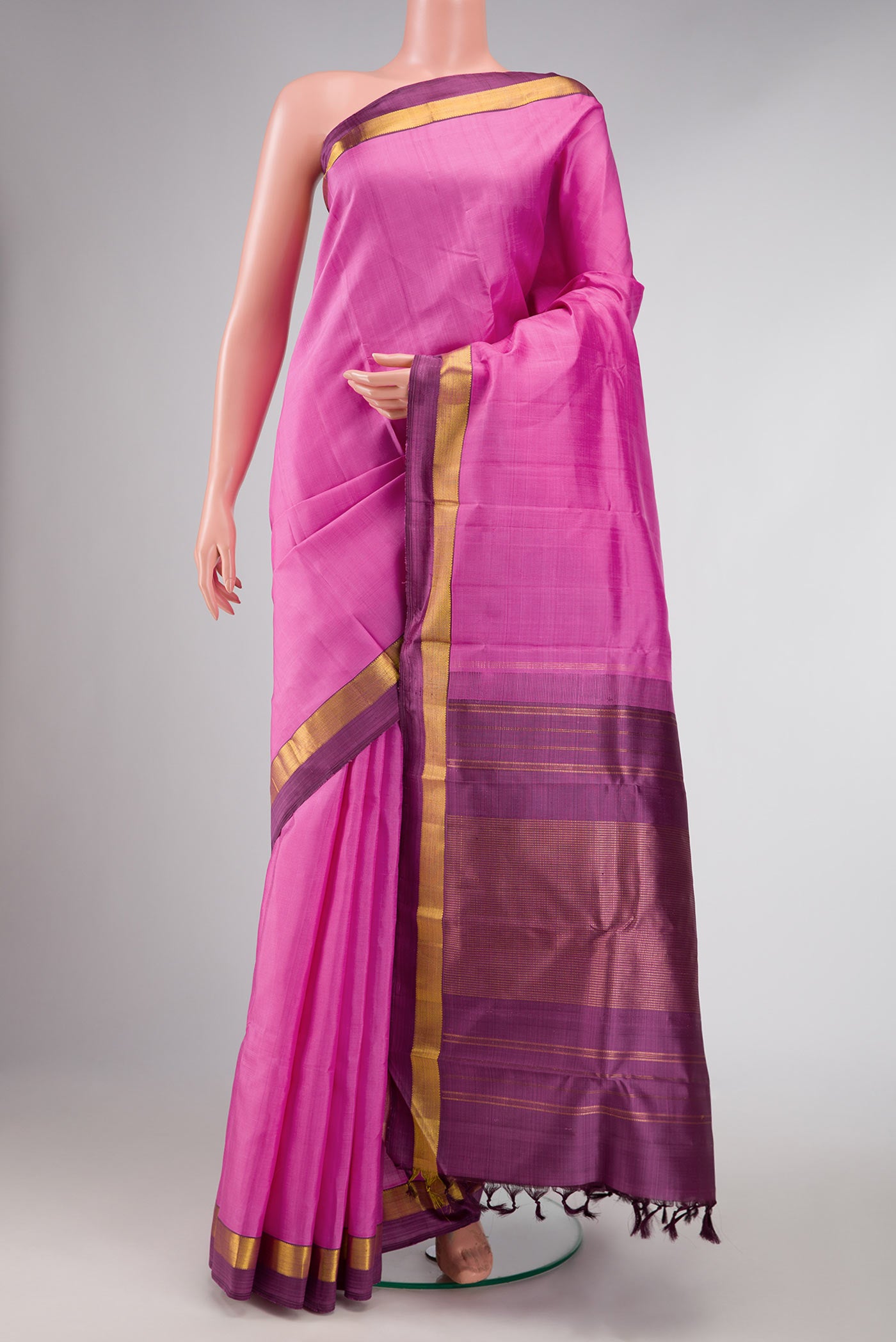 Pink Dual Tone Kanchipuram Silk Saree with Plain Body and Zari Border displayed on a mannequin