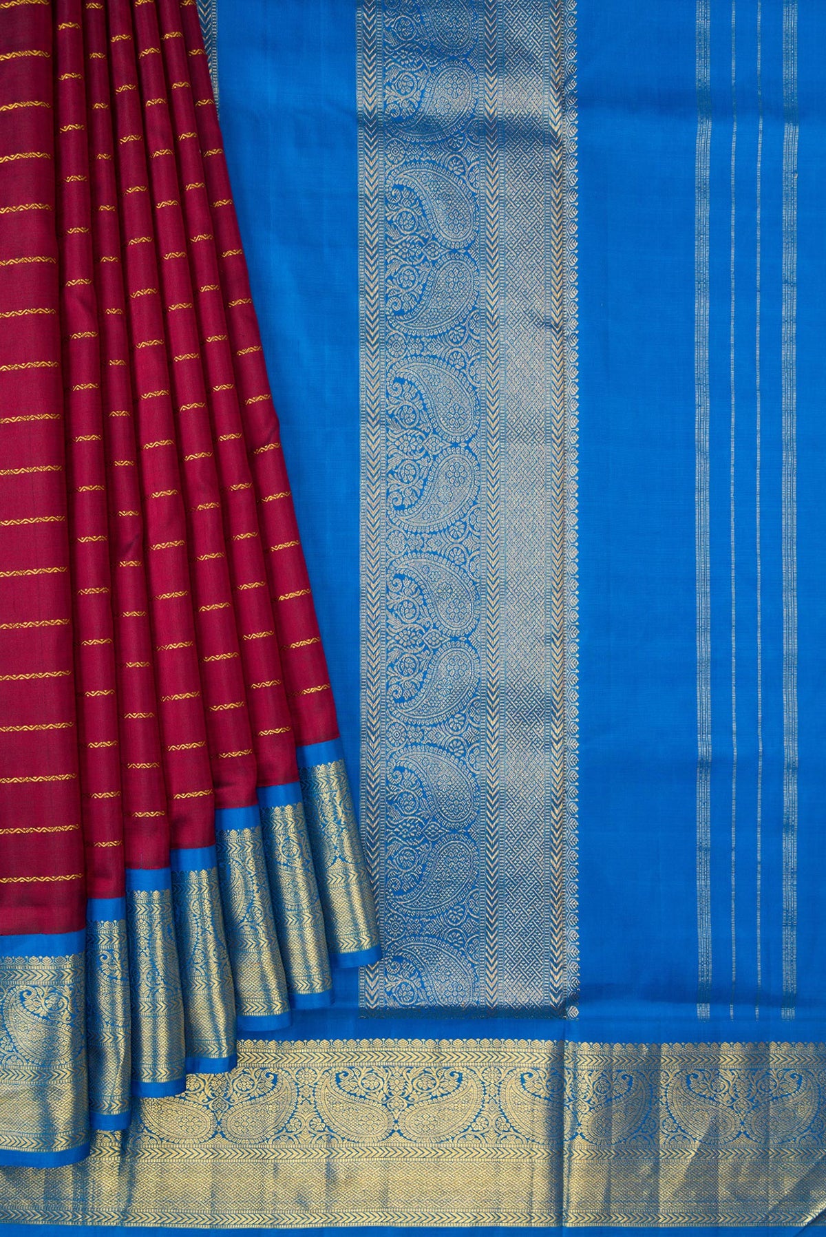 Pleats and pallu of Pure Silk Pure Zari Maroon Dual Tone Kanchipuram Nine Yards Saree with Stripes on the body and Zari Border. 