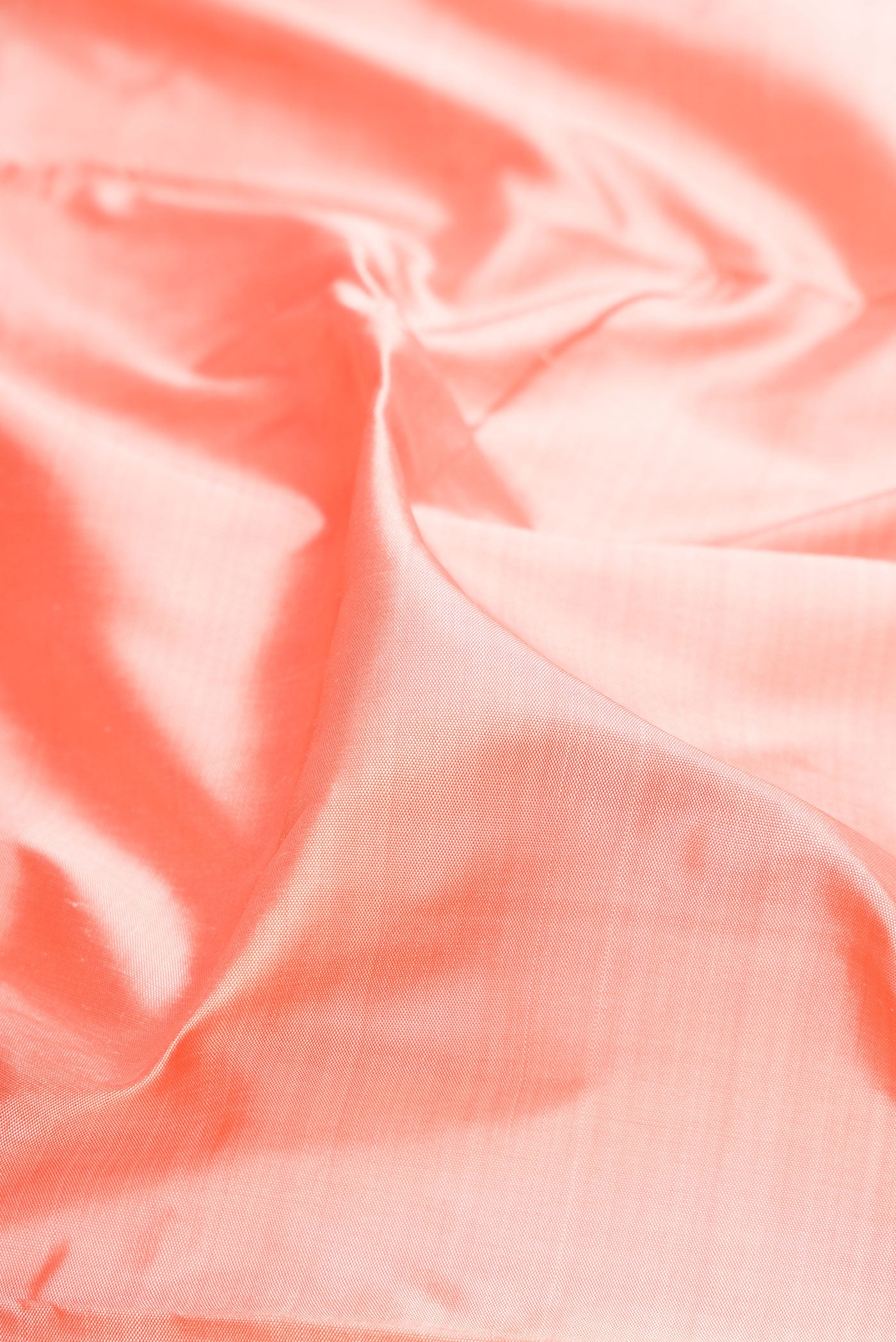 Close up of Pure Silk Pure Zari Golden Peach Kanchipuram Nine Yards Saree with Plain Body and Zari Border.  displaying folds
