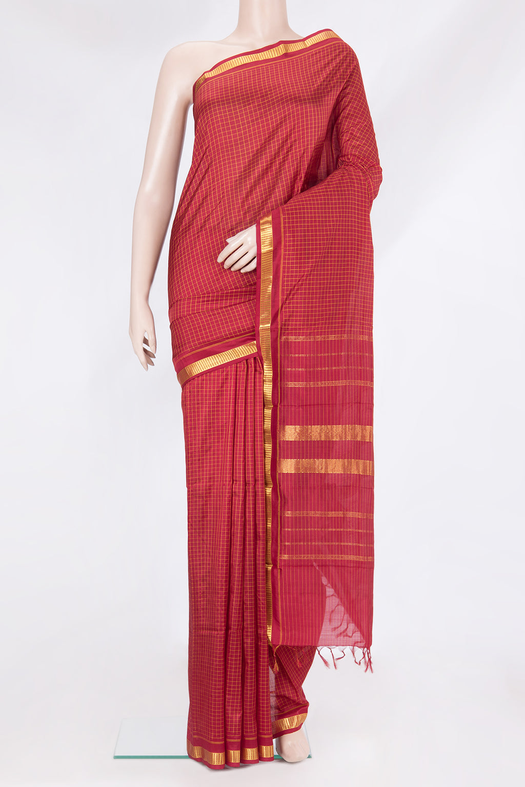 Maroon Kanjivaram Silk Saree with Checked design on the body and Zari Border.  displayed on a mannequin