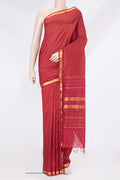 Maroon Kanjivaram Silk Saree with Checked design on the body and Zari Border.  displayed on a mannequin