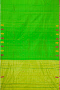 Green Dual Tone Kanchipuram Silk Saree with Thread Butta on the body and Thread Border.  displayed on a mannequin