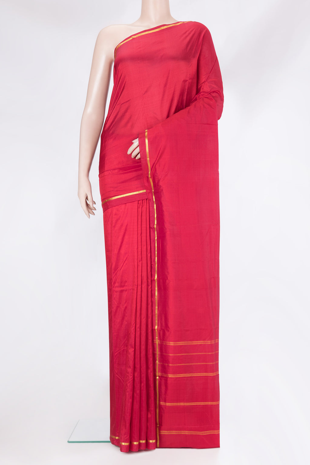 Maroon Kanchipuram Silk Saree with Plain Body and Zari Border.  displayed on a mannequin