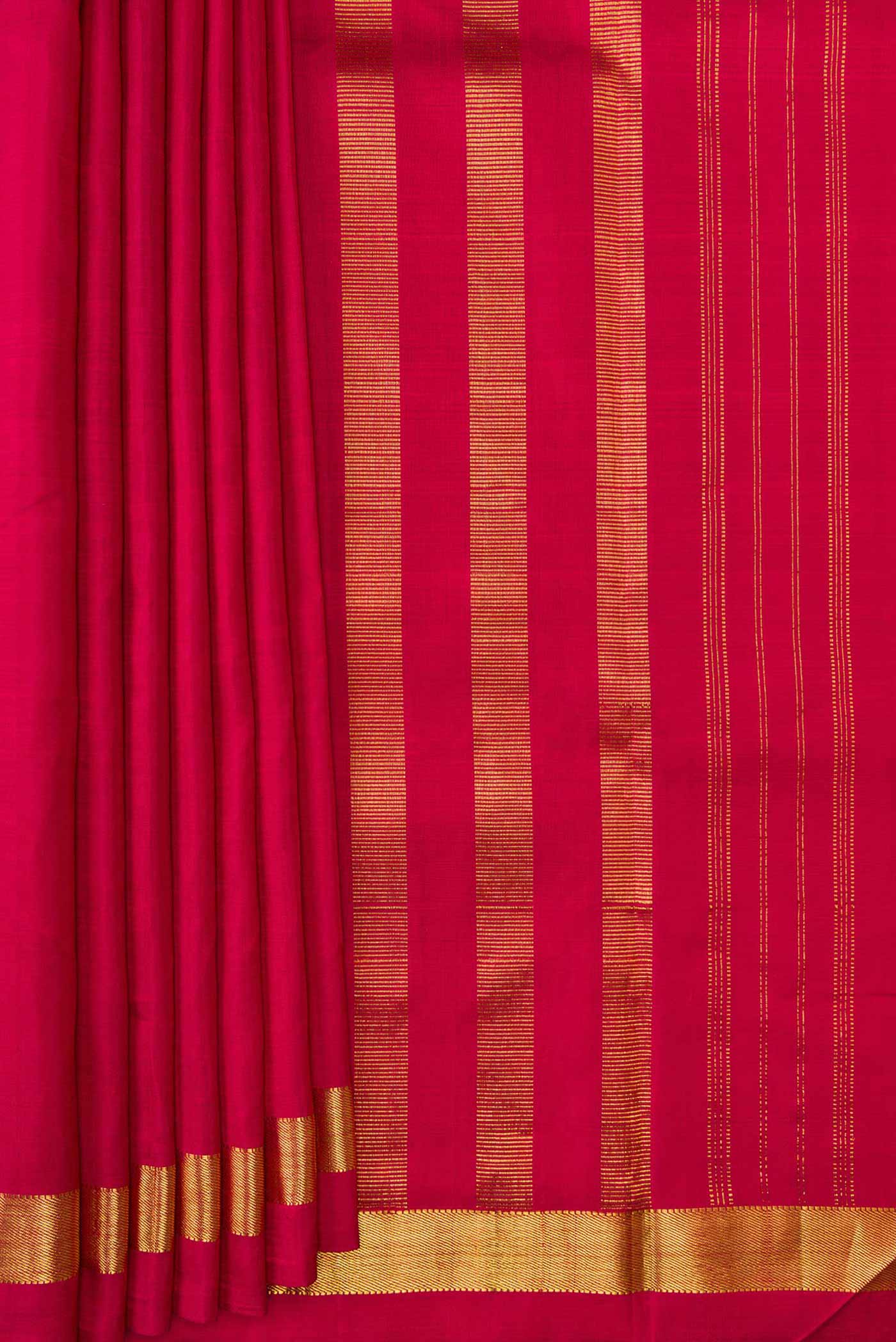 Pleats and pallu of Maroon Dual Tone Kanjivaram Silk Saree with Plain Body and Zari Border. 