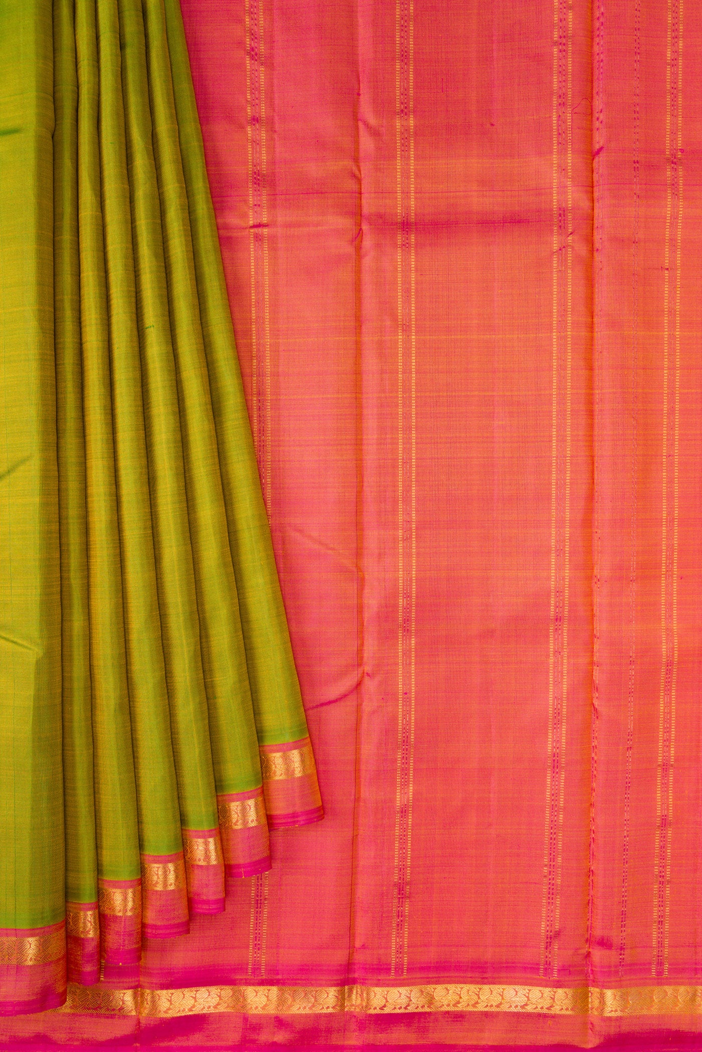 Pleats and pallu of Parrot Green Dual Tone Kanchipuram Silk Saree with Plain Body and Zari Border. 