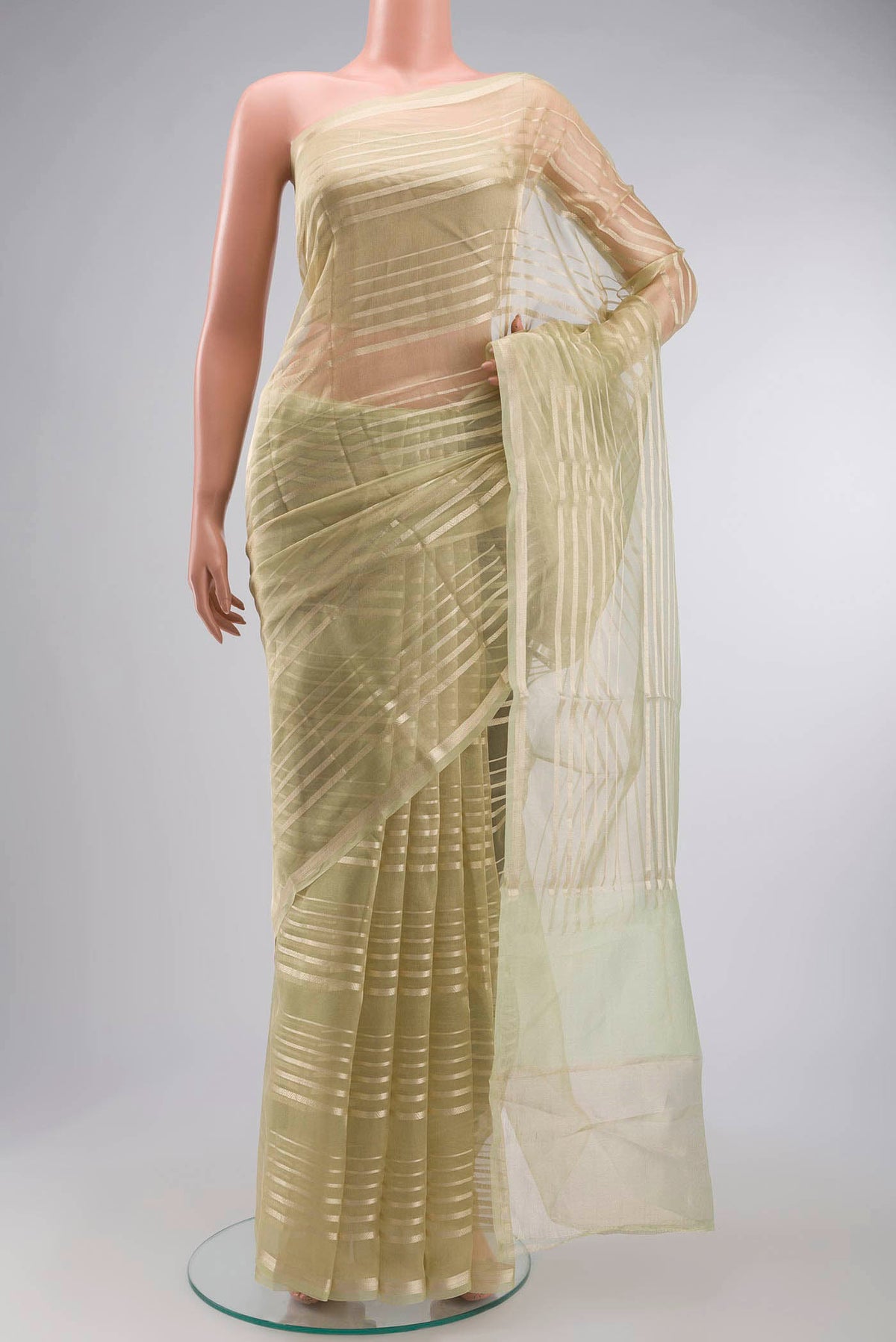 Beige Tissue Silk Saree with Stripes on the body and Zari Border displayed on a mannequin