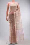 Pink Tissue Silk Saree with Stripes on the body and Zari Border displayed on a mannequin
