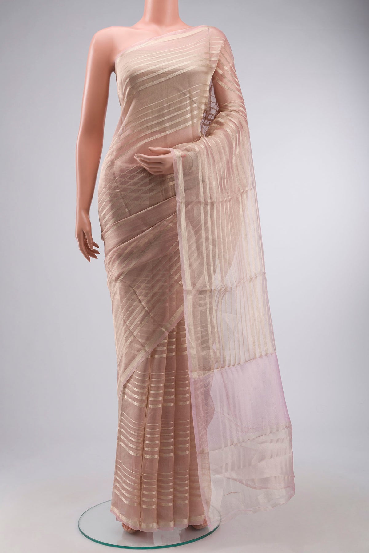 Pink Tissue Silk Saree with Stripes on the body and Zari Border displayed on a mannequin