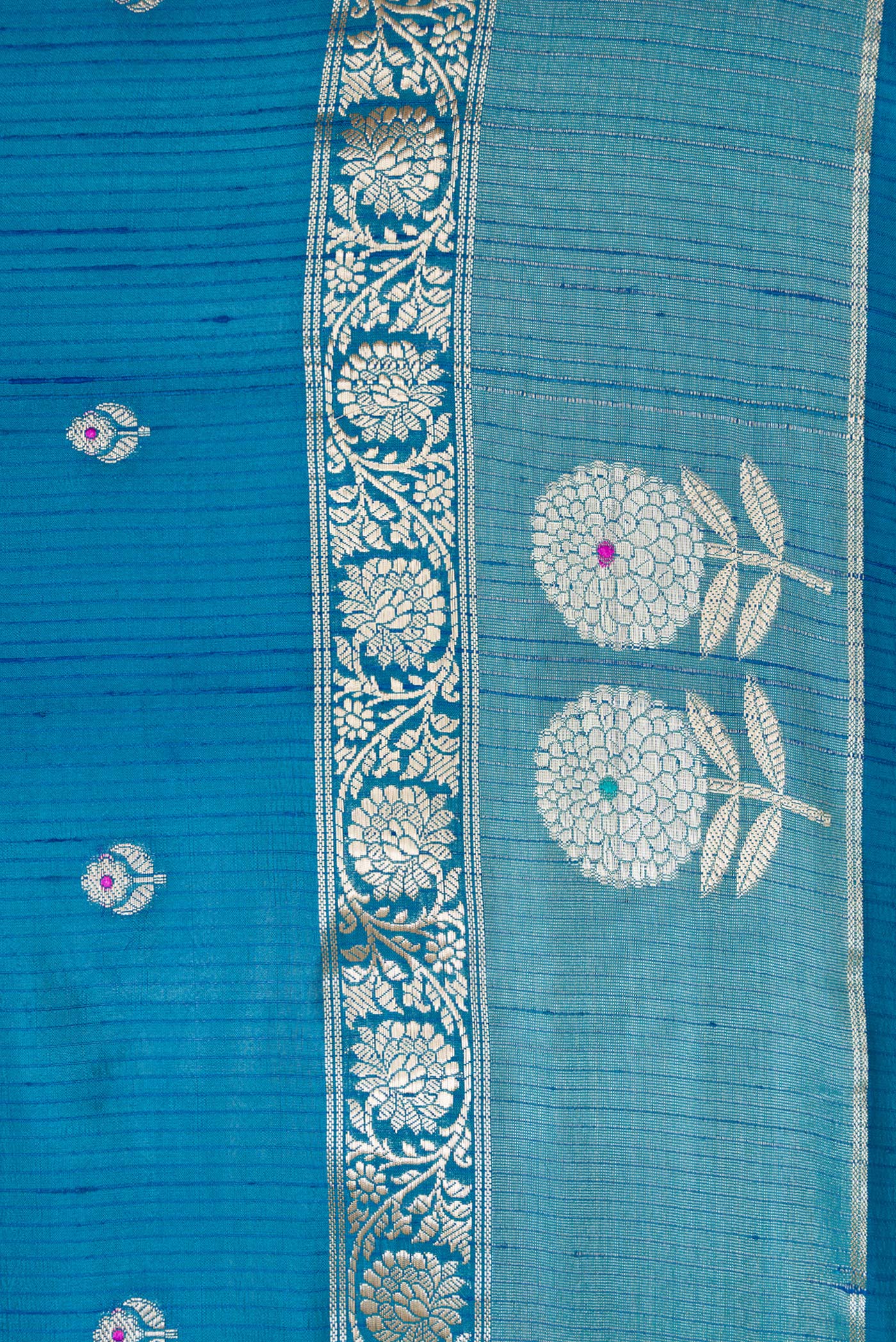 Border image of Peacock Blue Dual Tone Tussar Silk Saree with Zari Butta on the body and Zari Border. 