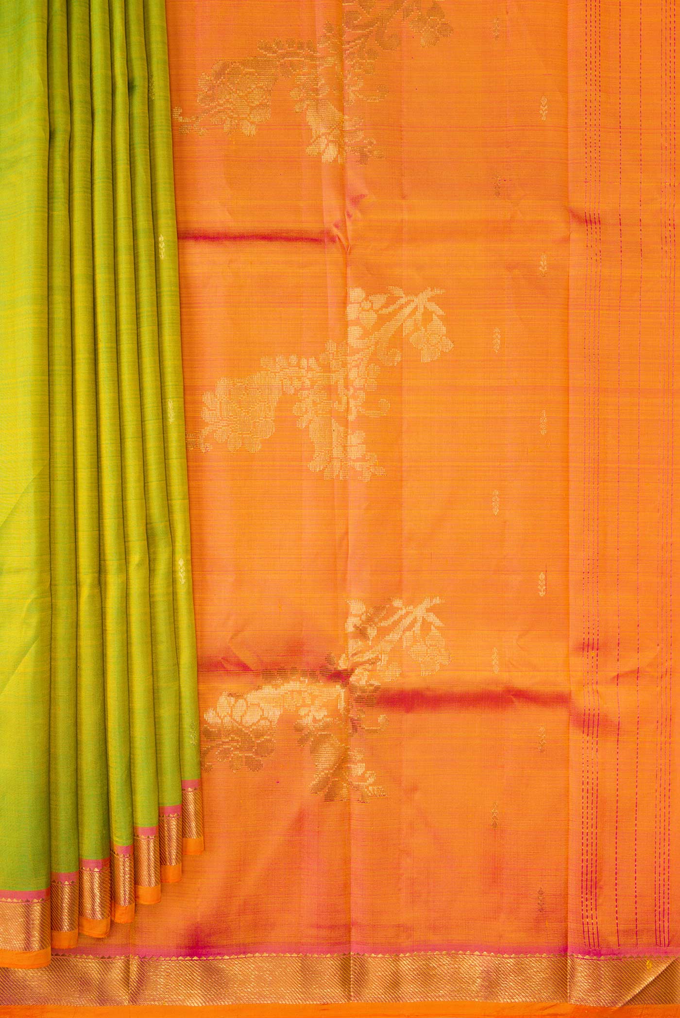 Pleats and pallu of Parrot Green Dual Tone Kanchipuram Silk Saree with Zari Butta on the body and Zari Border. 