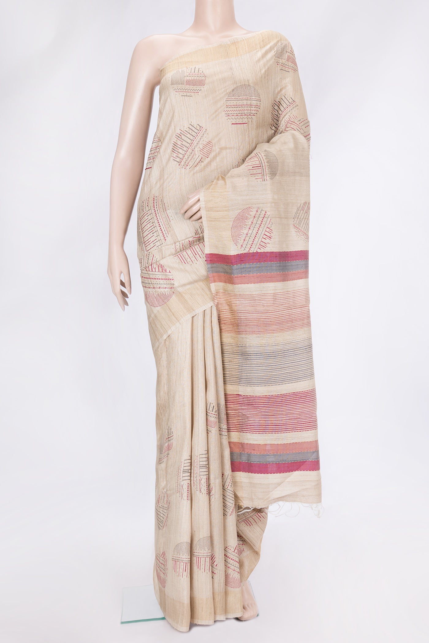 Beige Dual Tone Tussar Silk Saree with Thread Butta on the body and Zari Border.  displayed on a mannequin