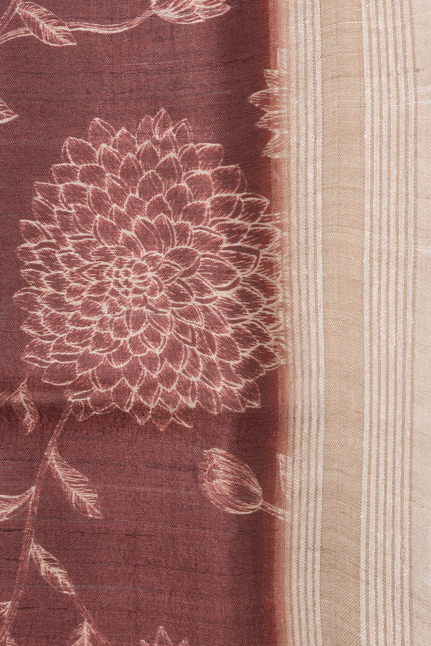 Border image of Maroon Dual Tone Tussar Silk Saree with Printed design on the body and Zari Border. 