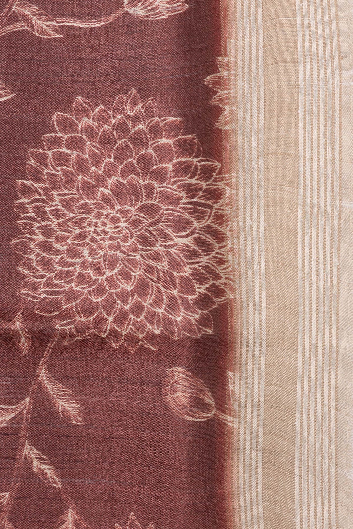 Border image of Maroon Dual Tone Tussar Silk Saree with Printed design on the body and Zari Border. 