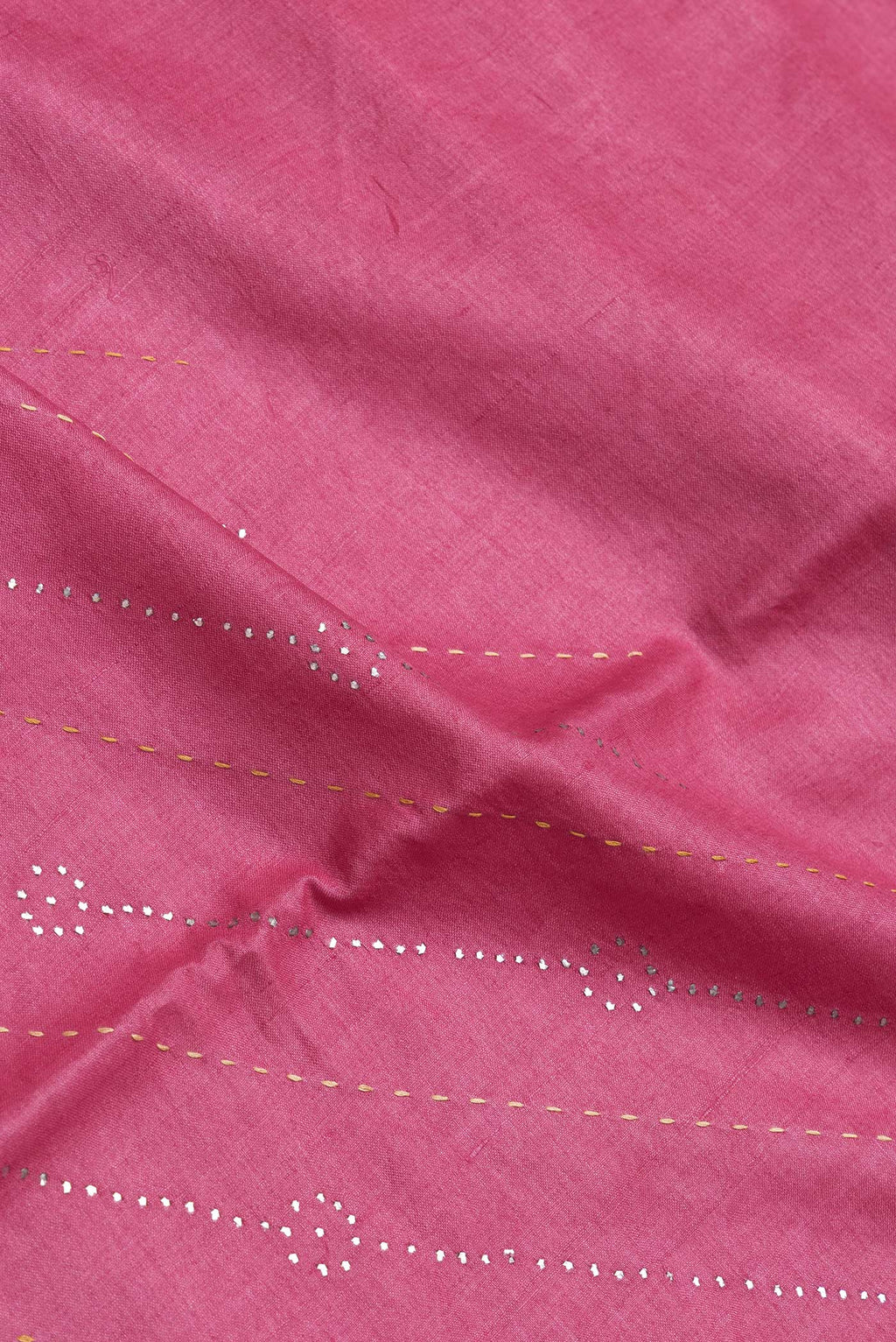Close up of Pink Dual Tone Tussar Silk Saree with Embroidery on the body and Embroidery Border.  displaying folds