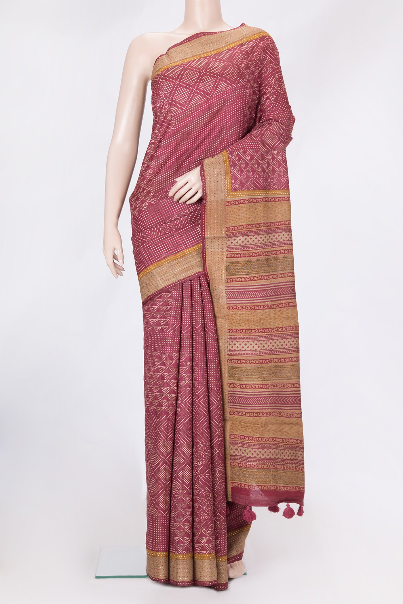 Maroon Dual Tone Tussar Silk Saree with Printed design on the body and Zari And Thread Border.  displayed on a mannequin