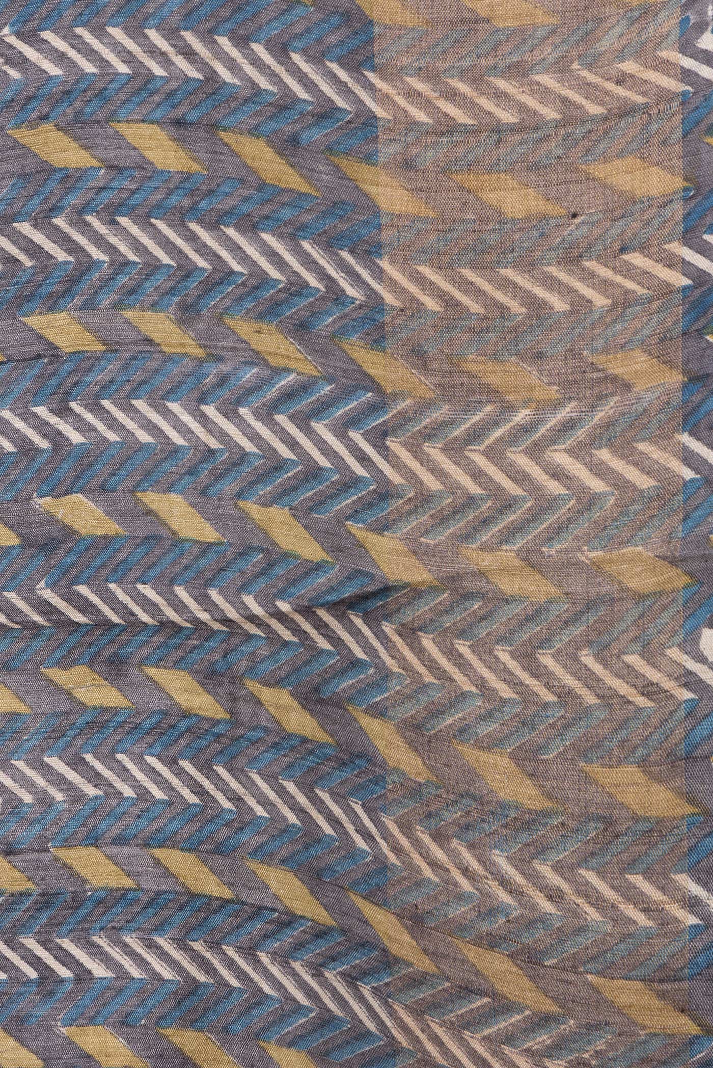 Border image of Navy Blue Dual Tone Tussar Silk Saree with Printed design on the body and Zari And Thread Border. 
