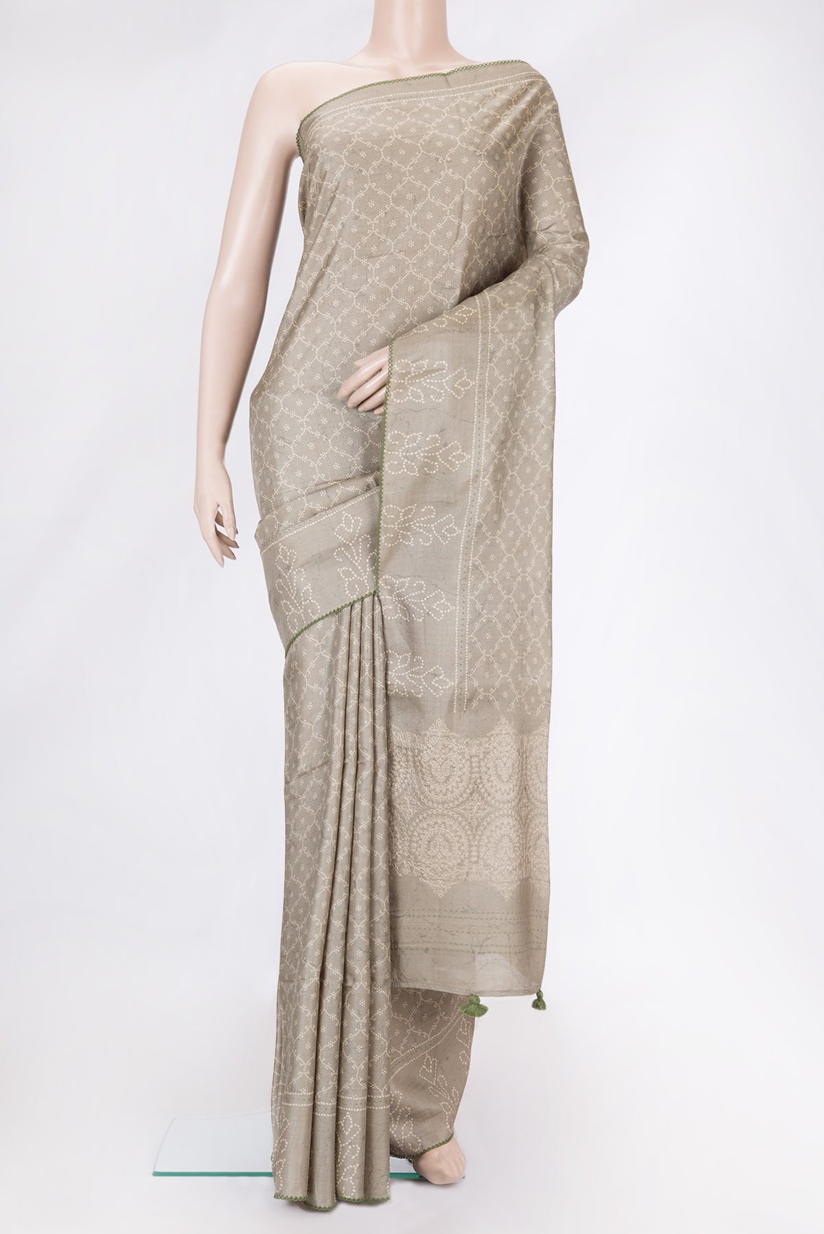 Brown Dual Tone Tussar Silk Saree with Printed design on the body and Printed Border.  displayed on a mannequin