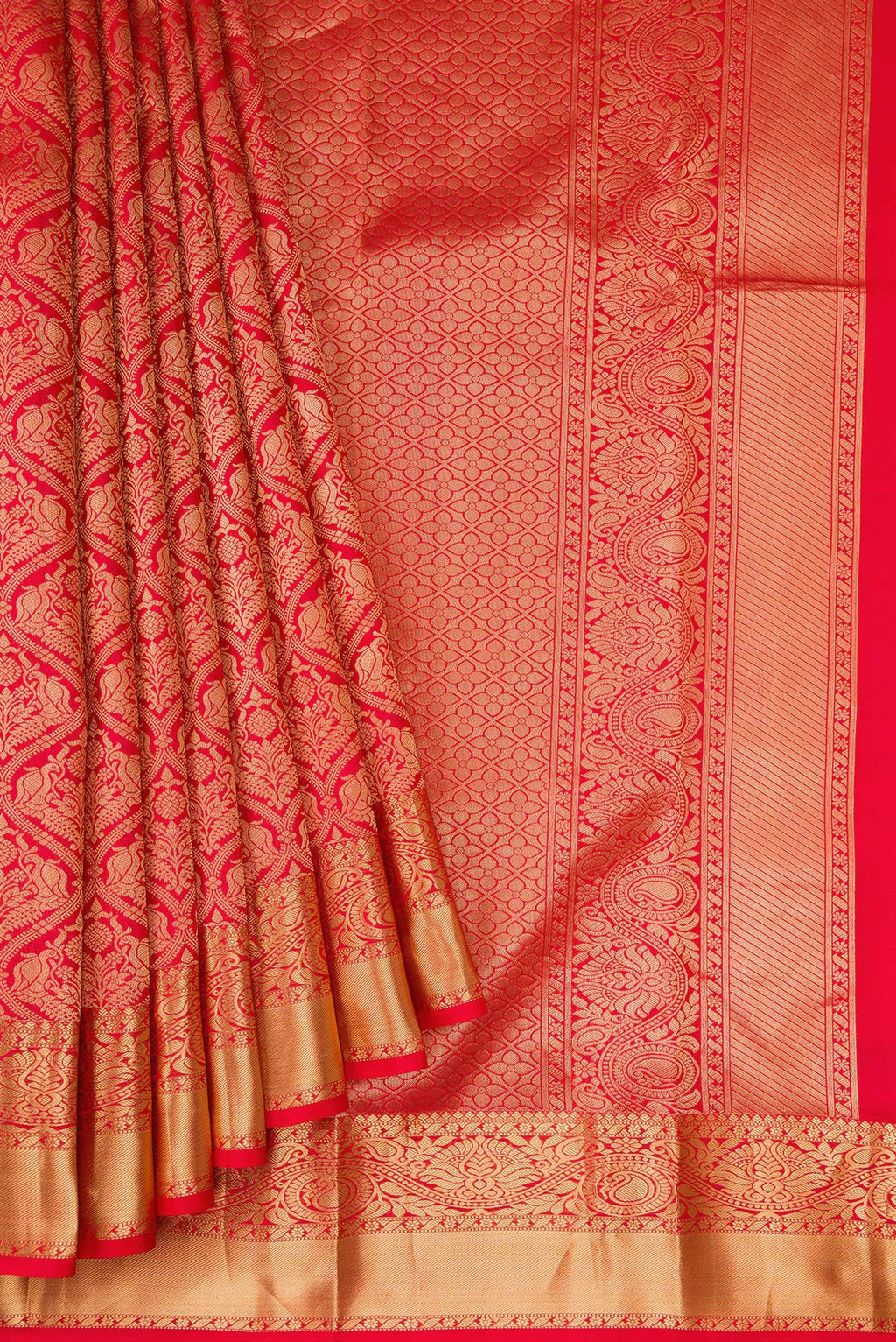 Pleats and pallu of Red Kanchipuram Silk Saree with Zari Brocade on the body and Zari Border. 