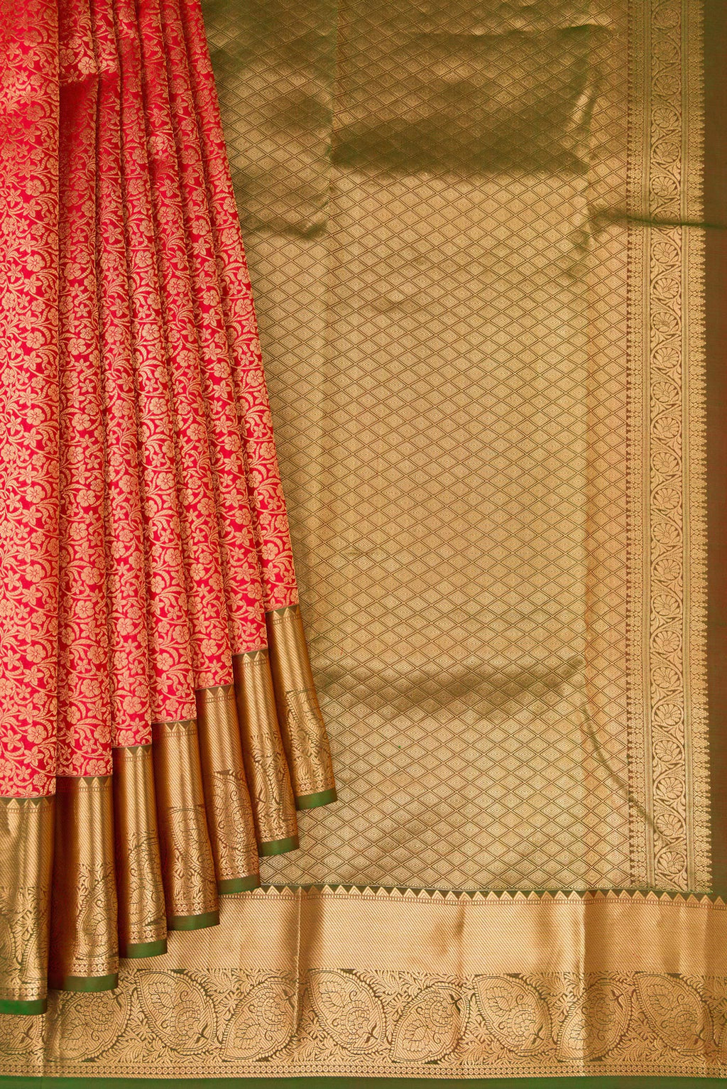 Pleats and pallu of Red Kanchipuram Silk Saree with Zari Brocade on the body and Zari Border. 