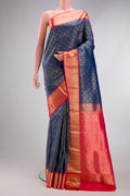 Peacock Blue Kanjivaram Silk Saree with Zari Brocade on the body and Zari Border.  displayed on a mannequin