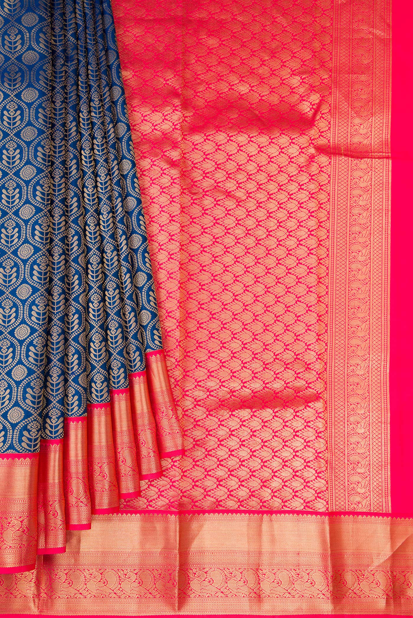 Pleats and pallu of Peacock Blue Kanjivaram Silk Saree with Zari Brocade on the body and Zari Border. 