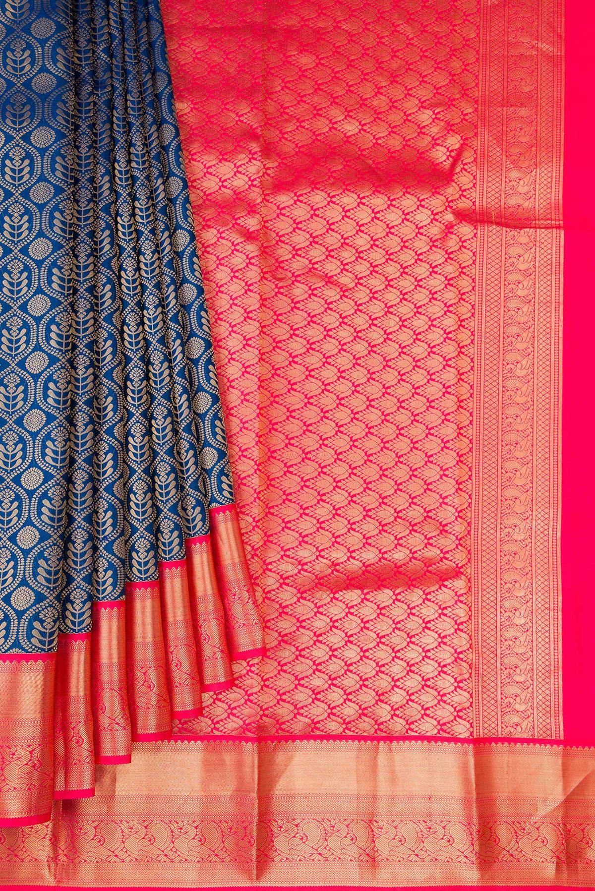 Pleats and pallu of Peacock Blue Kanjivaram Silk Saree with Zari Brocade on the body and Zari Border. 