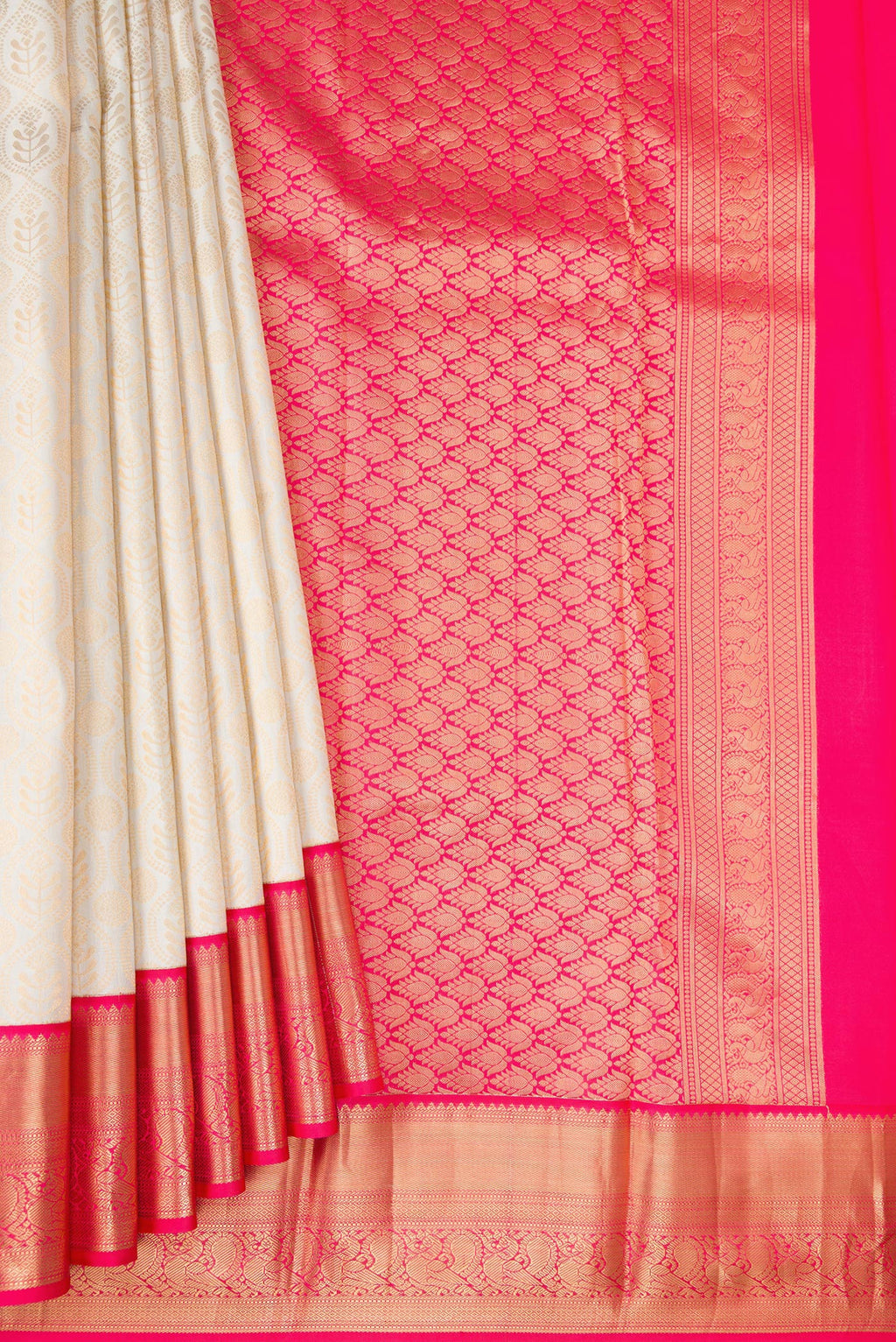 Pleats and pallu of Off White Kanjivaram Silk Saree with Zari Brocade on the body and Zari Border. 