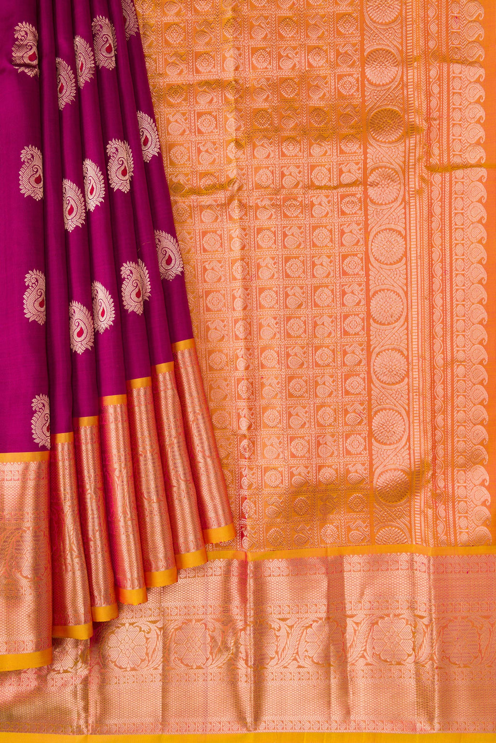 Pleats and pallu of Maroon Dual Tone Kanjivaram Silk Saree with Zari And Thread Butta on the body and Zari Border. 