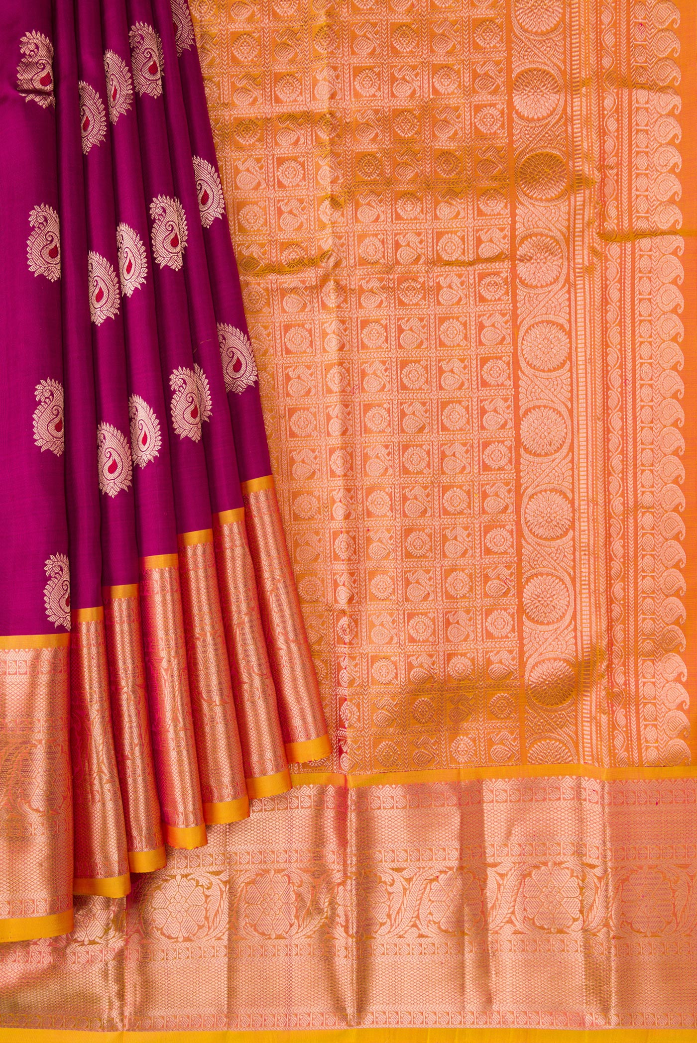 Pleats and pallu of Maroon Dual Tone Kanjivaram Silk Saree with Zari And Thread Butta on the body and Zari Border. 