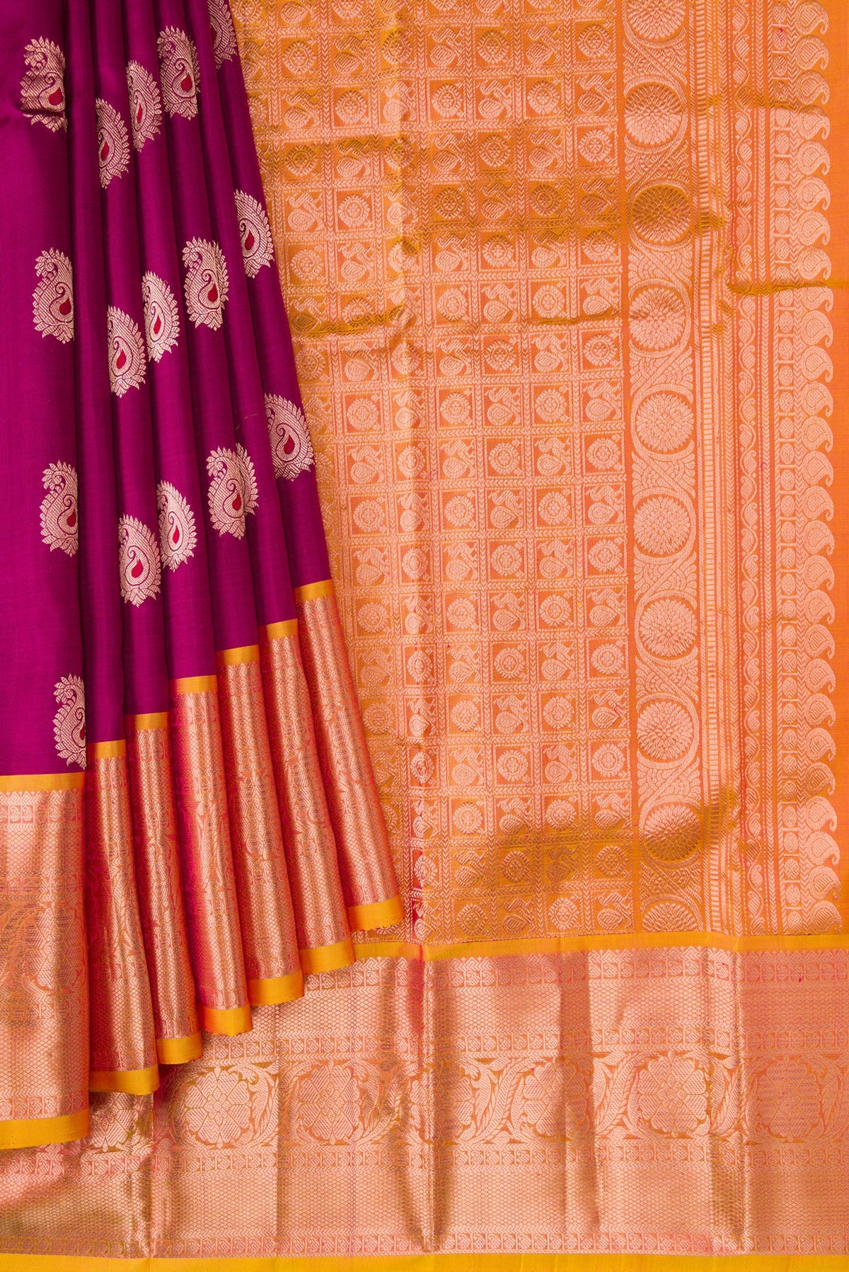 Pleats and pallu of Maroon Dual Tone Kanjivaram Silk Saree with Zari And Thread Butta on the body and Zari Border. 