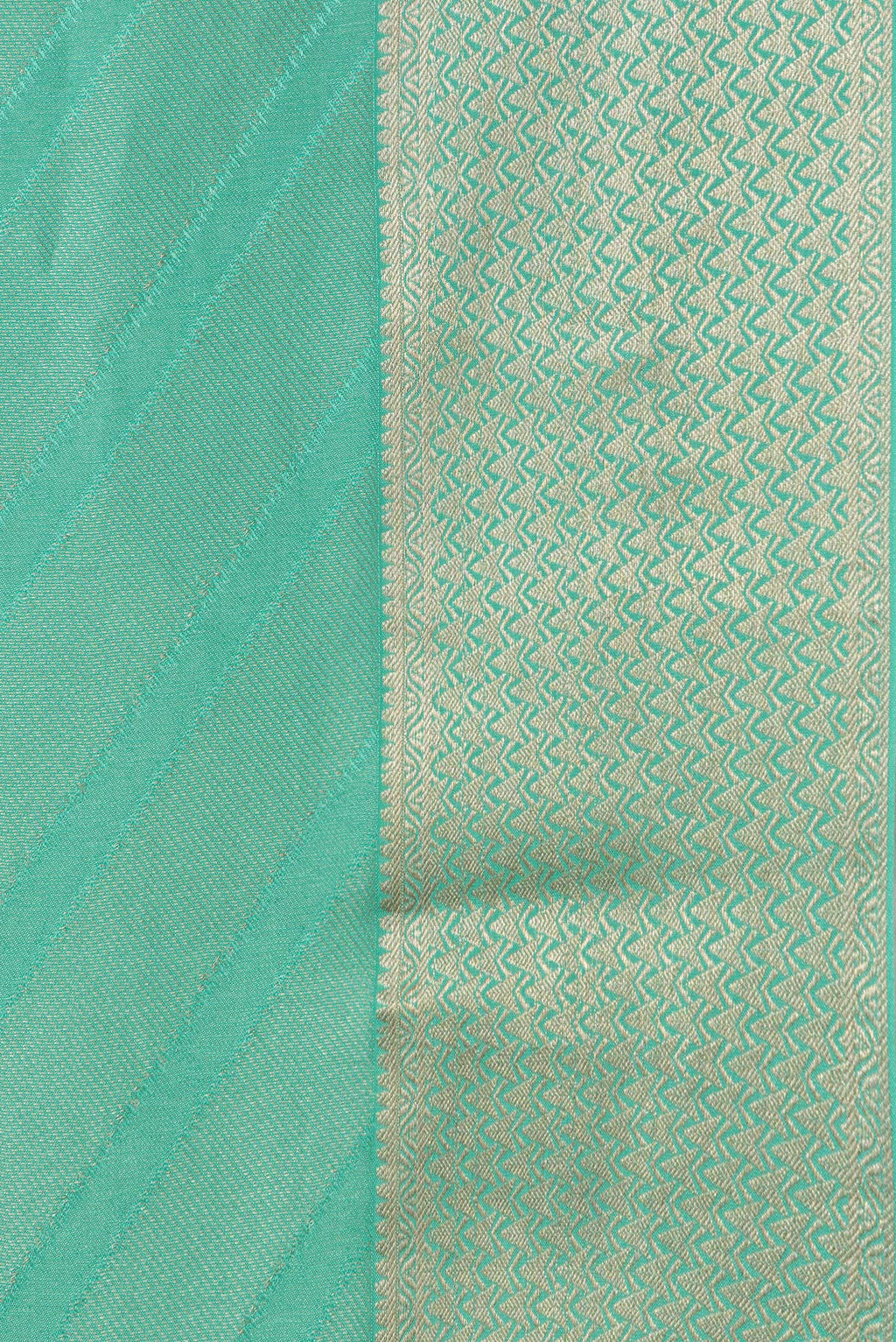 Border image of Sea Green Dual Tone Tussar Silk Saree with Zari Brocade on the body and Zari Border. 
