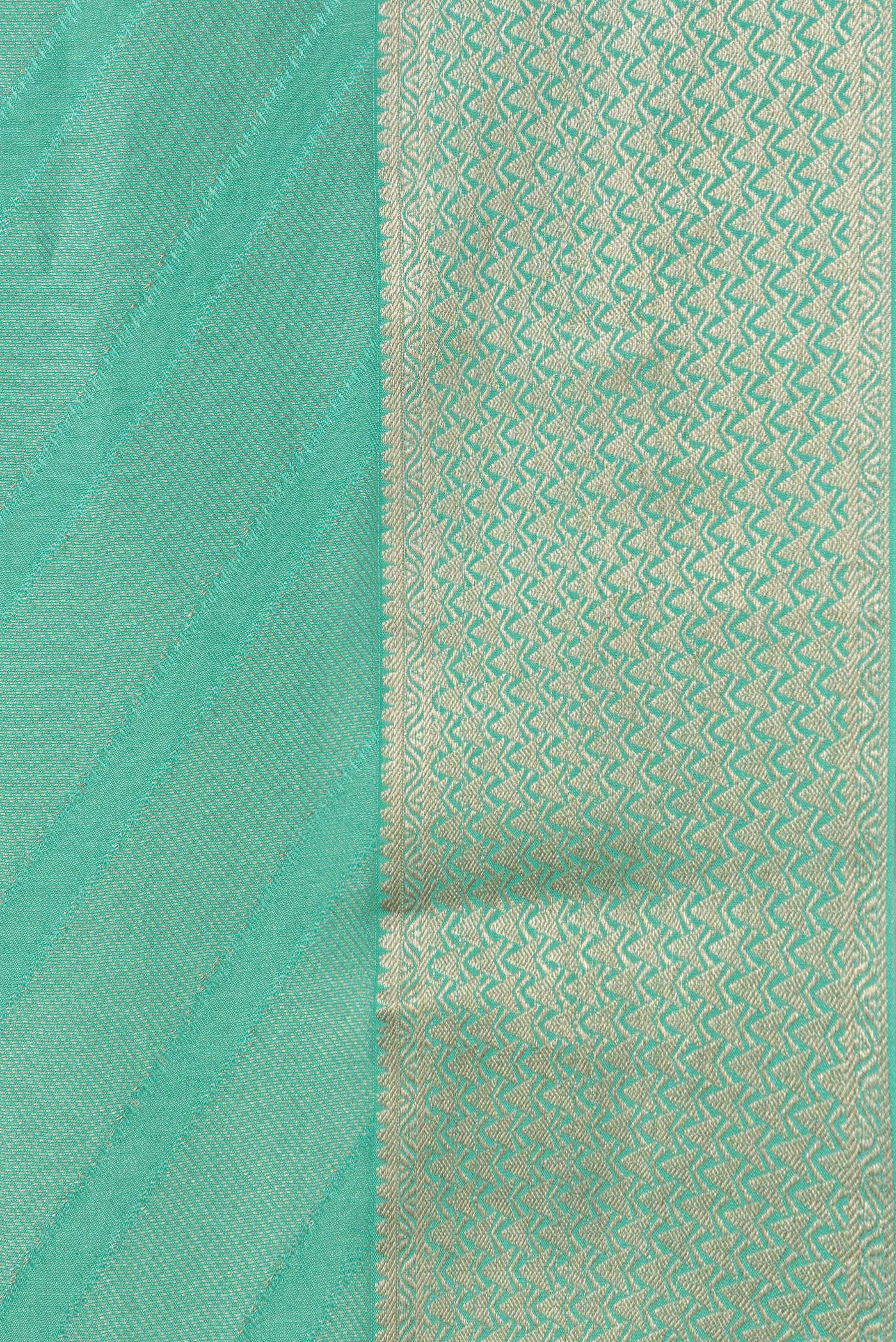 Border image of Sea Green Dual Tone Tussar Silk Saree with Zari Brocade on the body and Zari Border. 